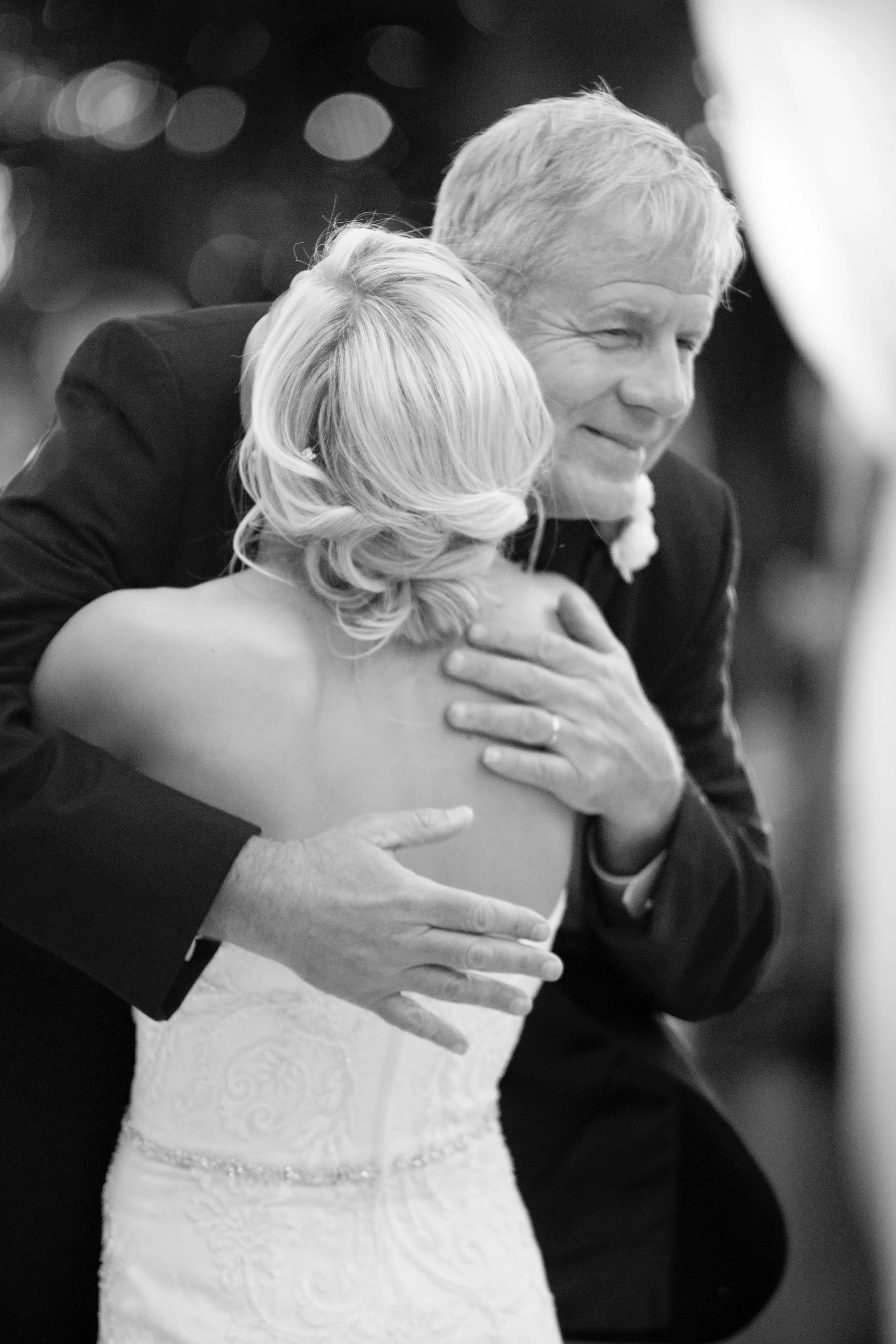 Trevor's customers, Meghan Green, embracing her father Mr. Stodgell on her wedding day.