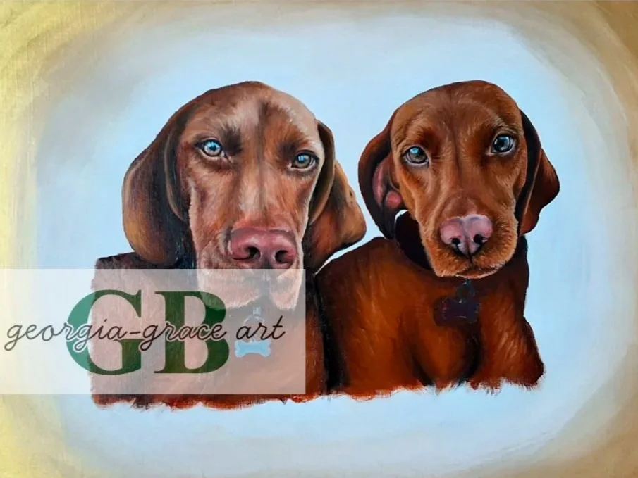 Painted portrait of two dogs with blue eyes, one with a slightly winking expression, against a soft, golden background.