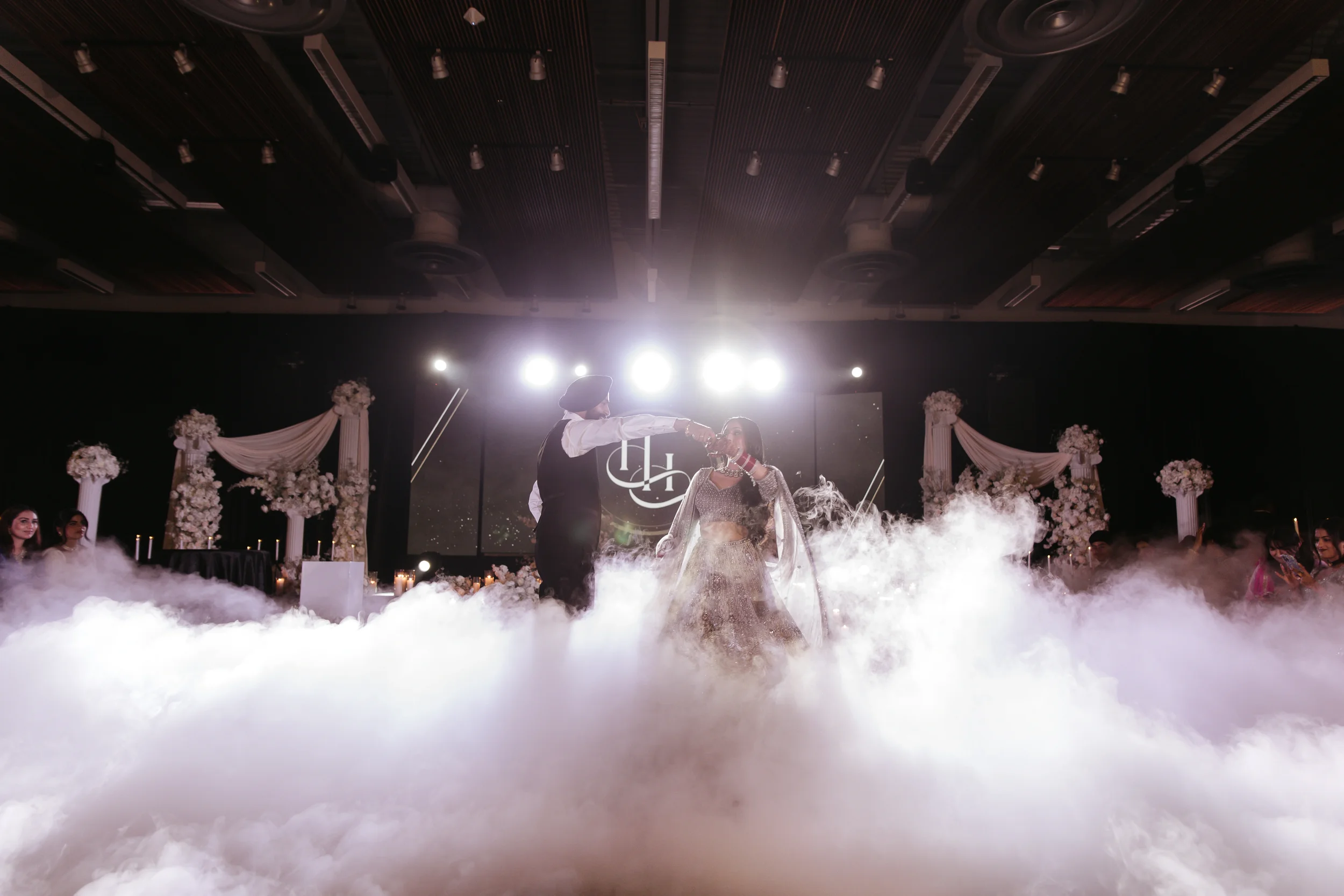first dance on clouds, luxury weddings, seattle weddings, video wall for weddings, lighting design for weddings