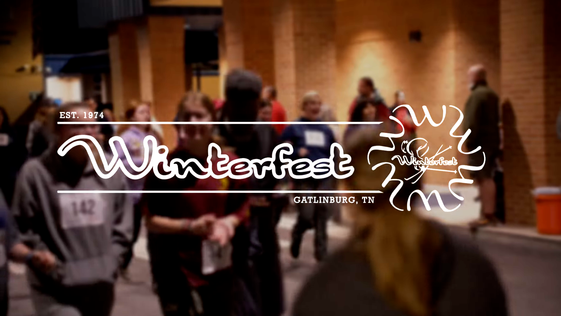 People participating in Winterfest event in Gatlinburg, Tennessee, with a promotional overlay.