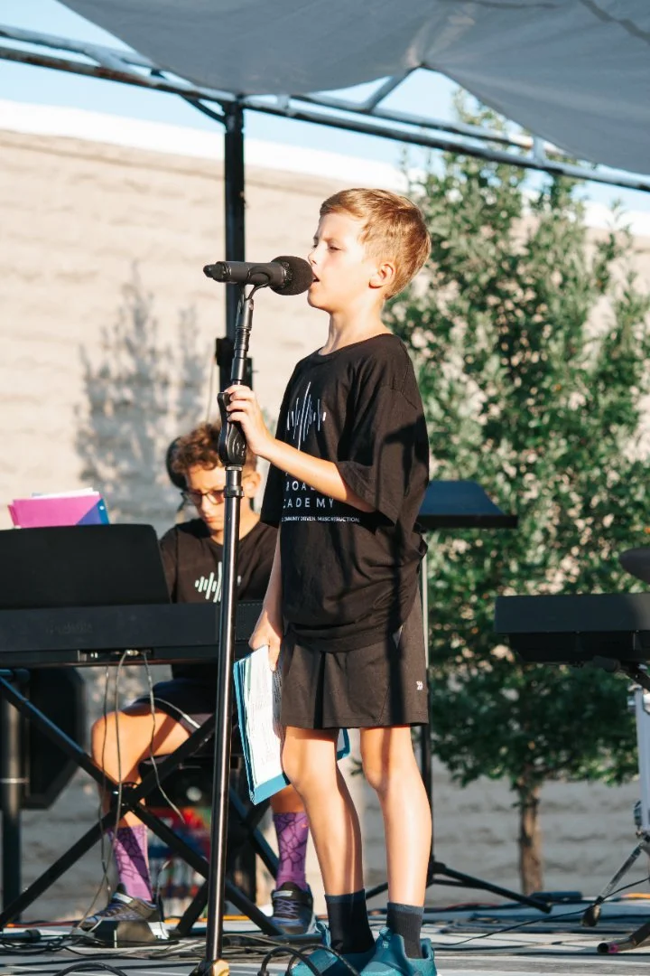 Anthem Road Academy boy singing.jpg