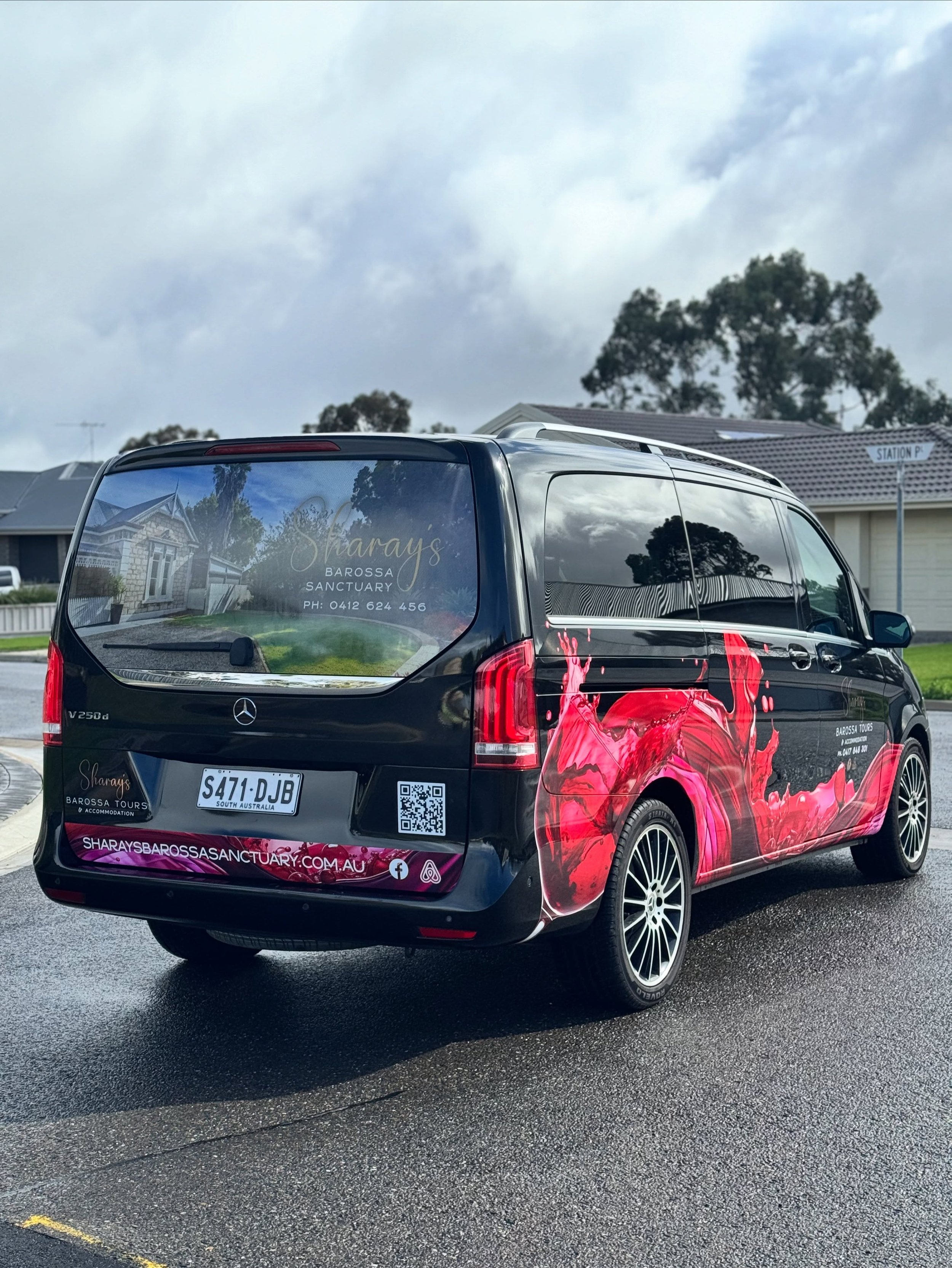 Tour van now ready to hit the road with a splashing vibrant partial wrap 🍷