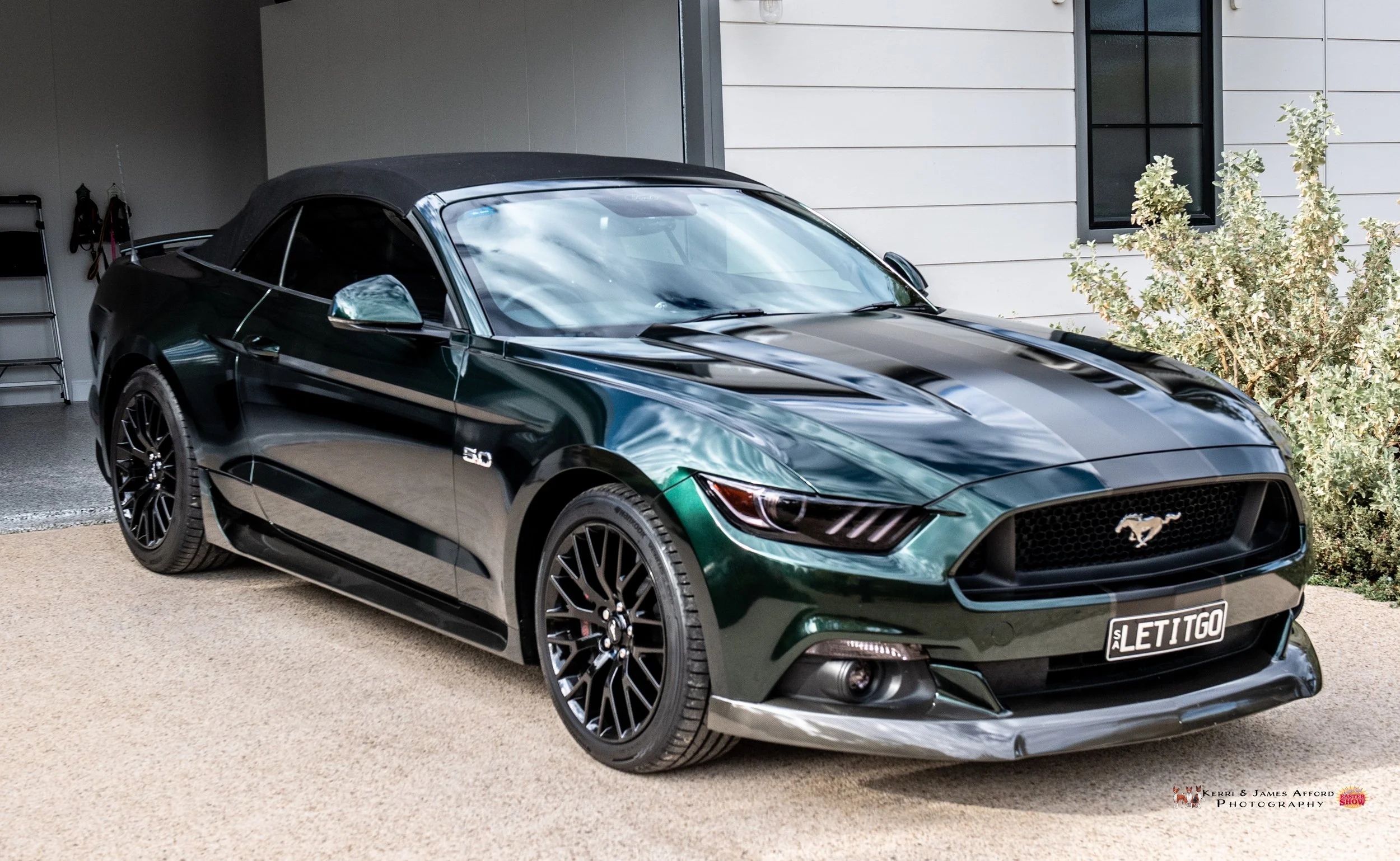 Full colour change in KPMF Green/ Black Iridescent. Satin black racing stripe with carbon fiber pin stripes, carbon front lip, carbon side skirt accents, tinted PPF headlights, fog lights, indicators and tail lights. All topped off with a ceramic coa