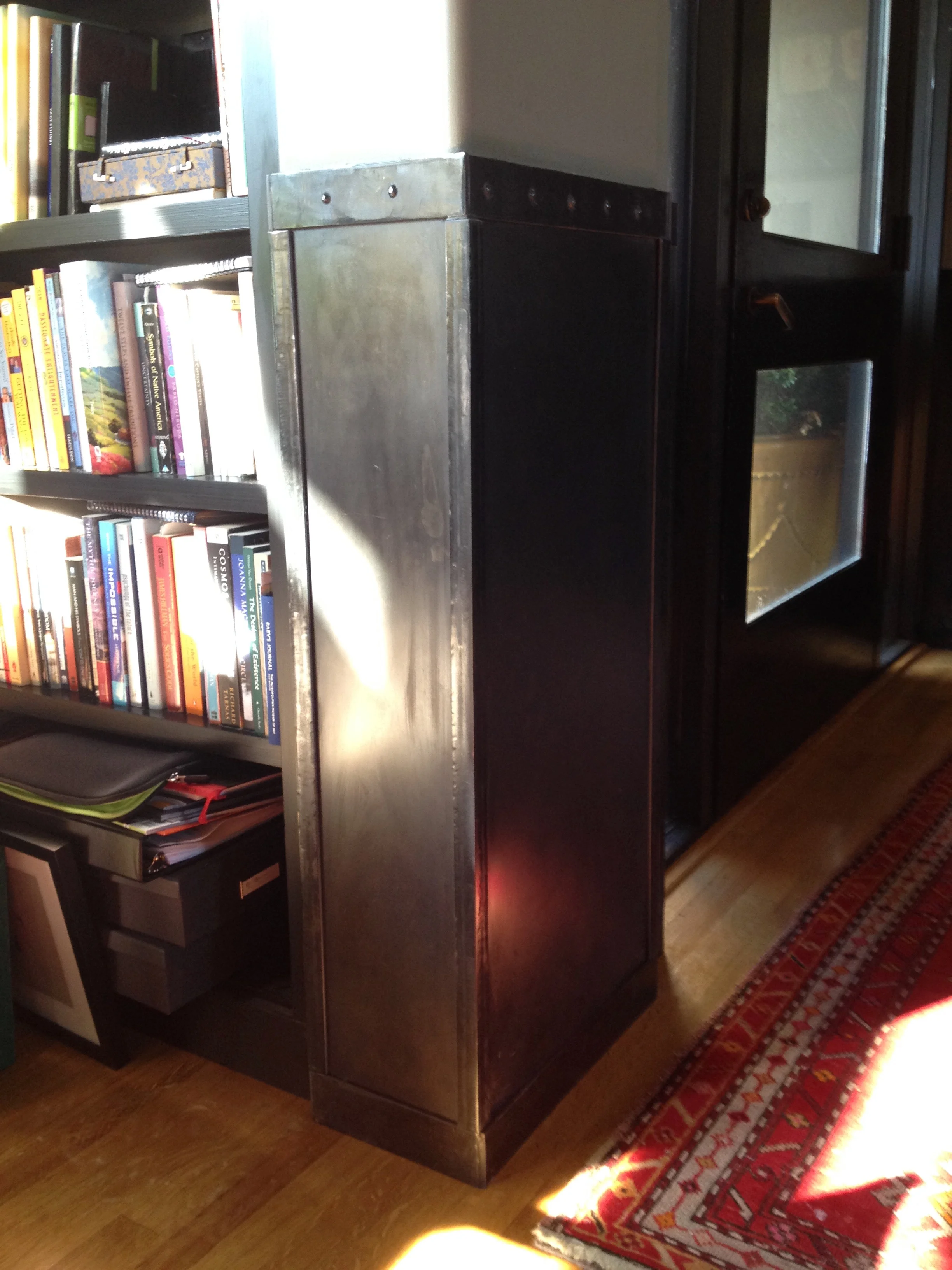   Steel Wainscoting   Custom steel wainscoting for a client in Larkspur, California. Designed with an elegant industrial style, this project jazzed up a previously boring entryway while protecting the walls from nicks and dents caused by daily life w