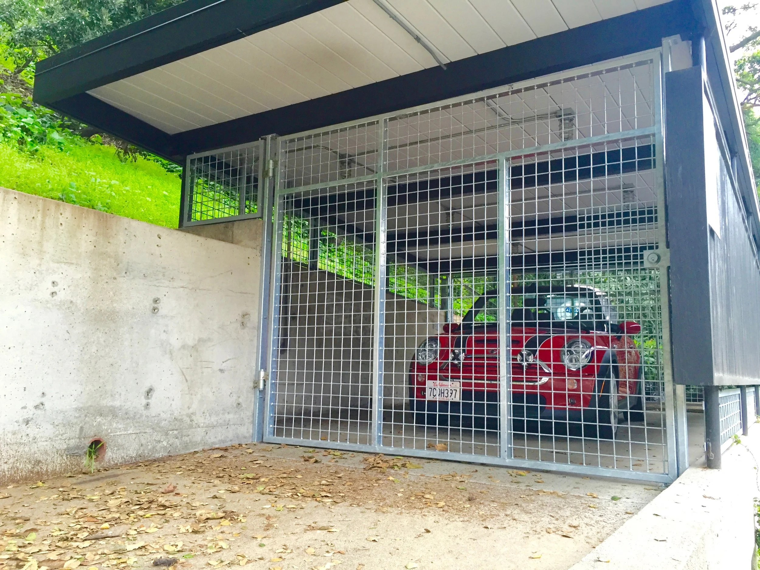   Berkeley carport gate   This update to a mid-century modern Berkeley carport provides security and style to a previously overlooked part of the house. This project was a collaboration between Yzzo Studios and Alward Construction of Berkeley. Crafte