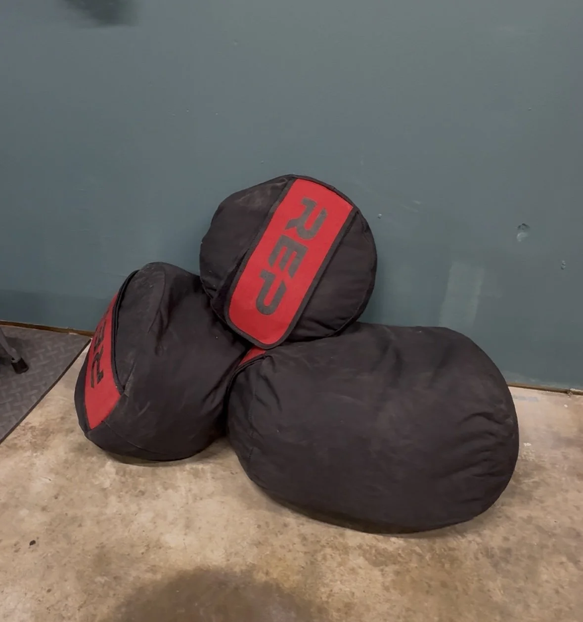 Geometric drawing of an outline square with sections divided by vertical, horizontal, and circle lines.