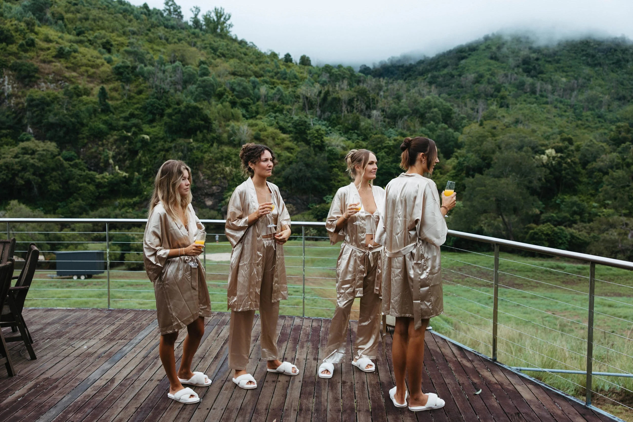 Bridal party in satin robes on the deck at Longview Farm, Mid North Coast wedding