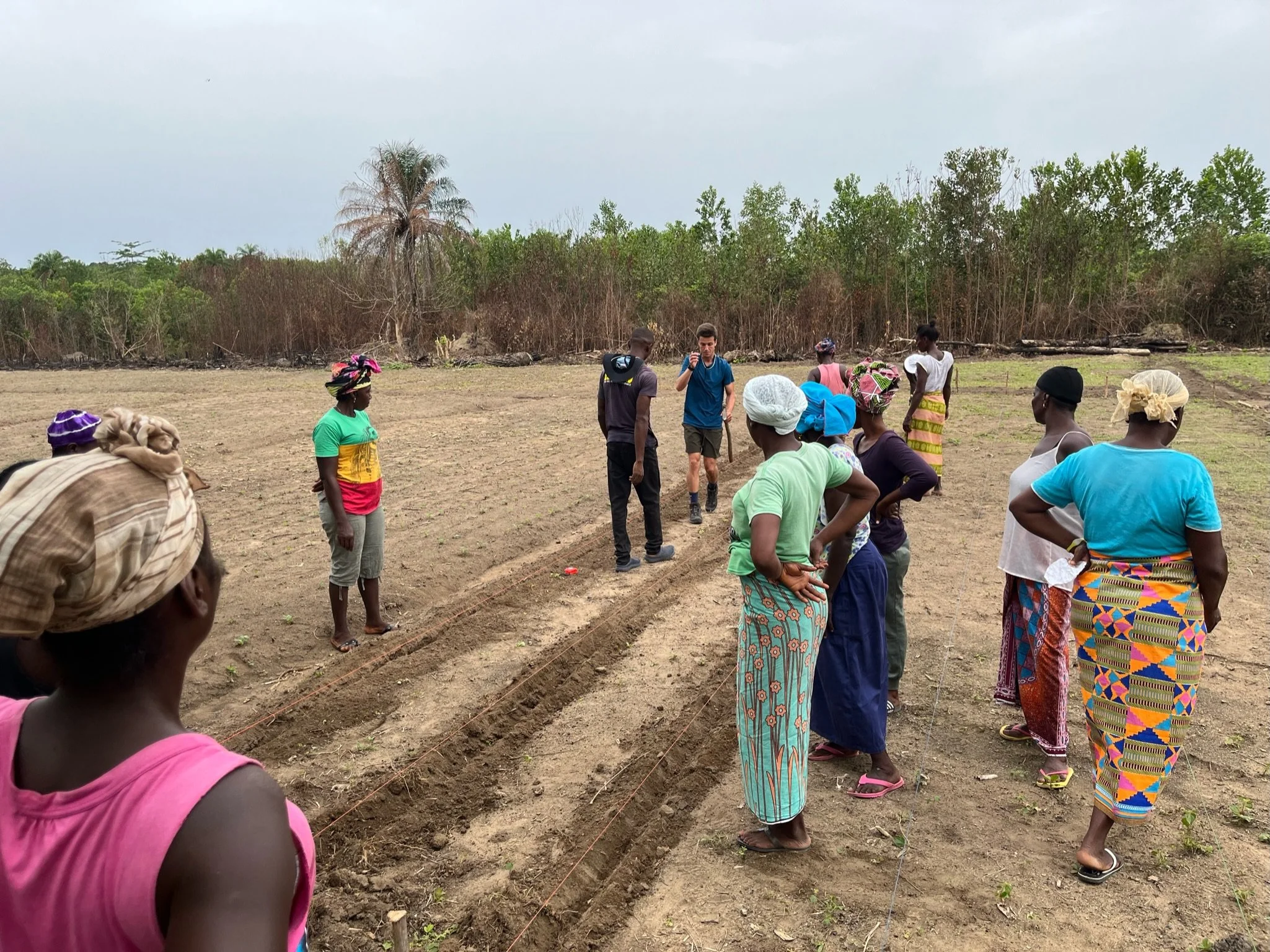 Growing the Grassroots team teaching women how to plant crops