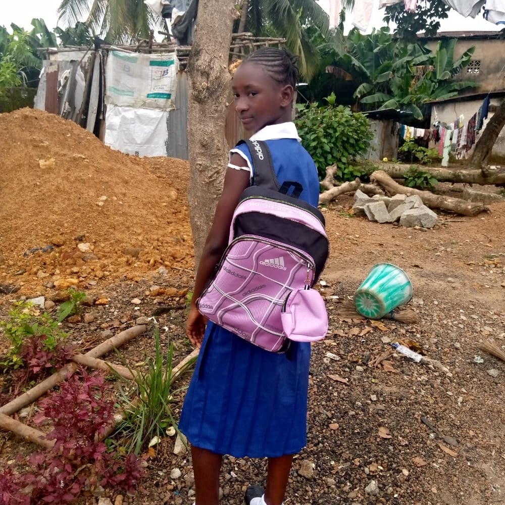 A child sent back to school by Growing the Grassroots