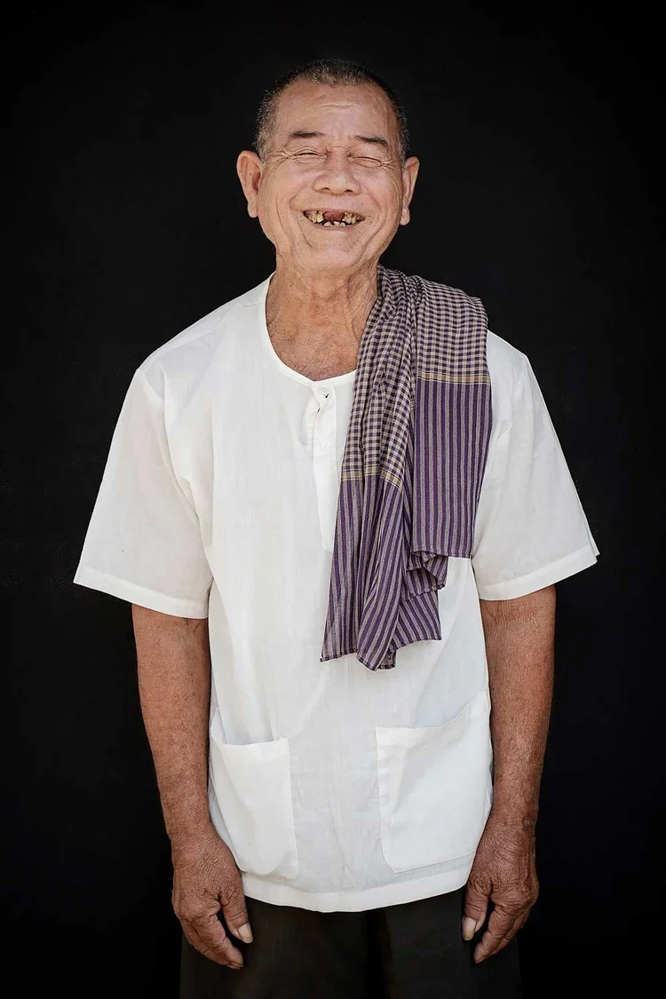 KenKai age 77: "I was born with just one eye working. My left eye has always been closed. When I was young I was a cowboy [a child who tends to the cows, walking them to and from the river each day, providing water and food]. I went to school at the 
