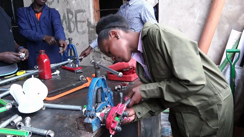 Nora learning skills as a plumber in vocational school
