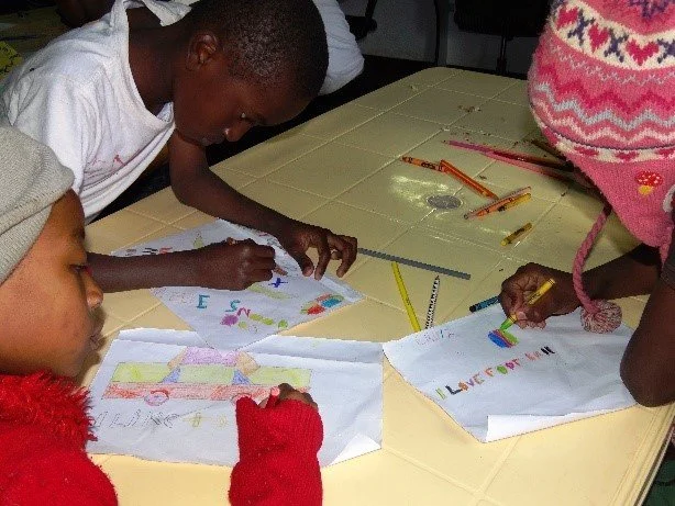 Young children drawing