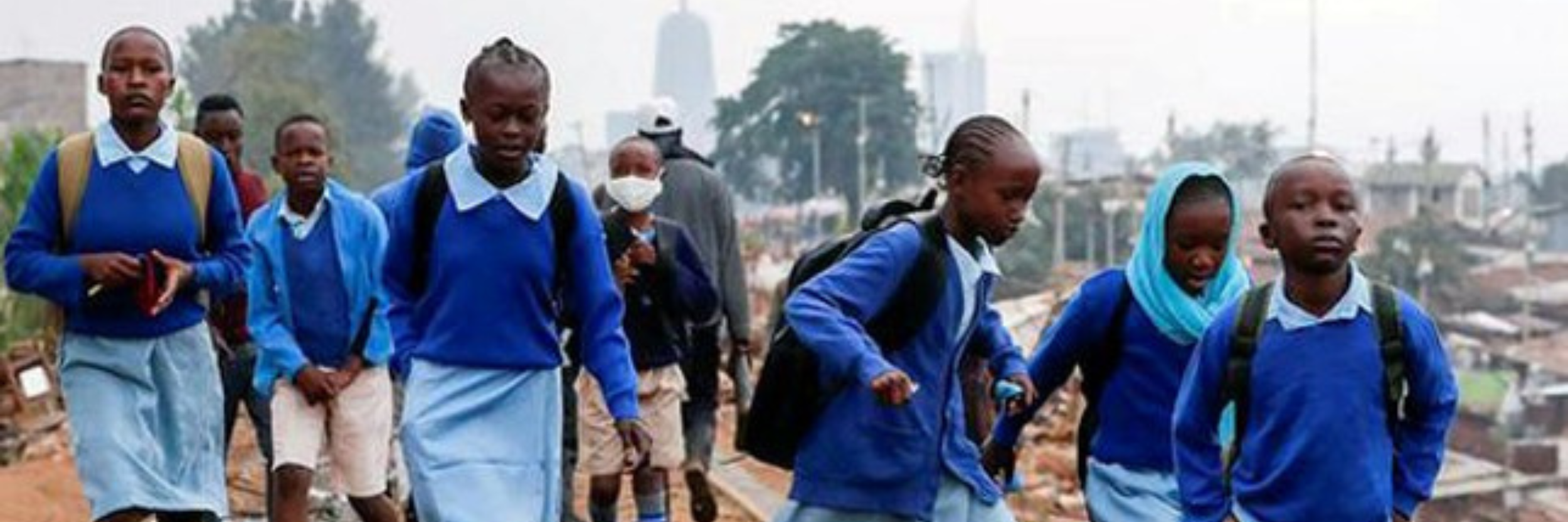 children walking to school in their uniforms