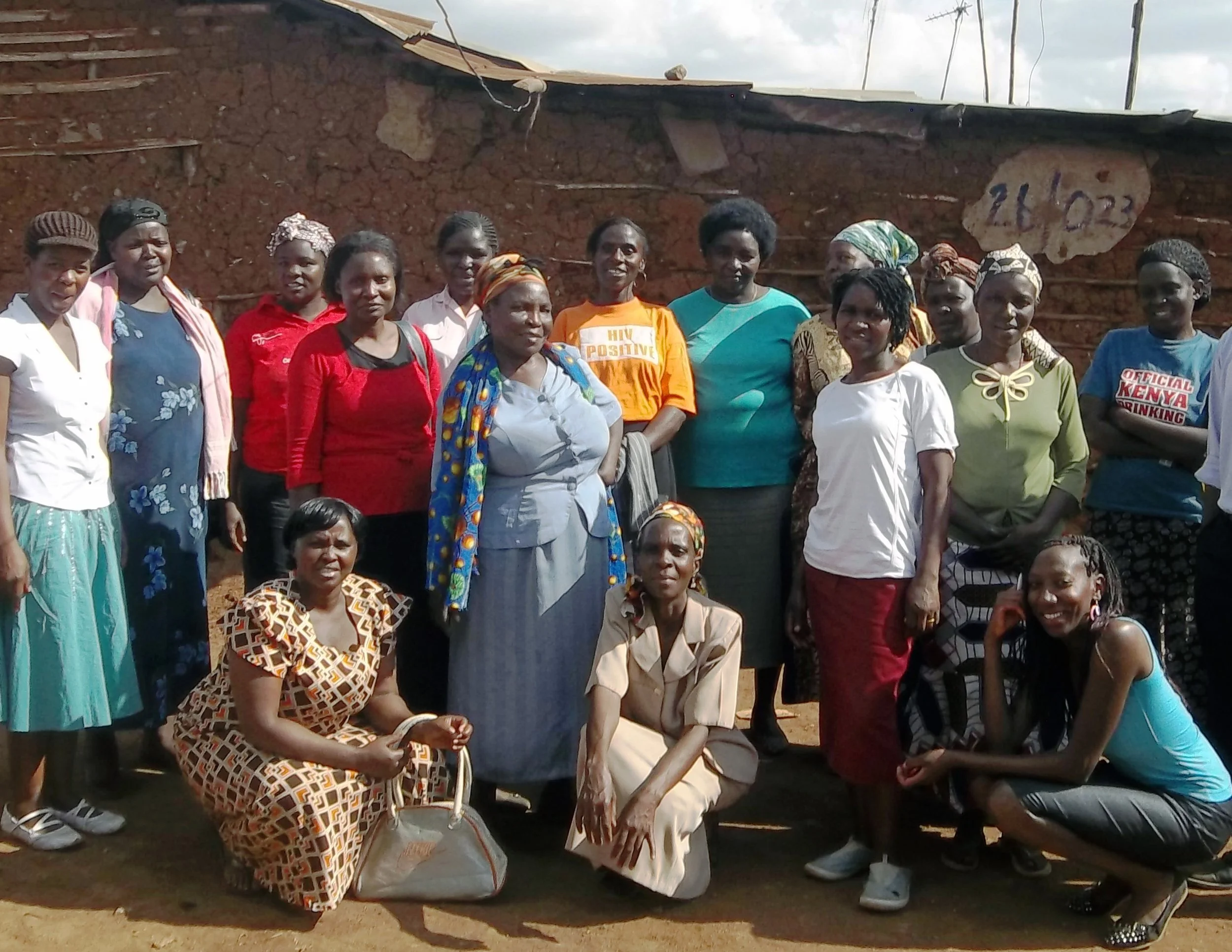 Early photo of Kijiji Cha Upendo members outside