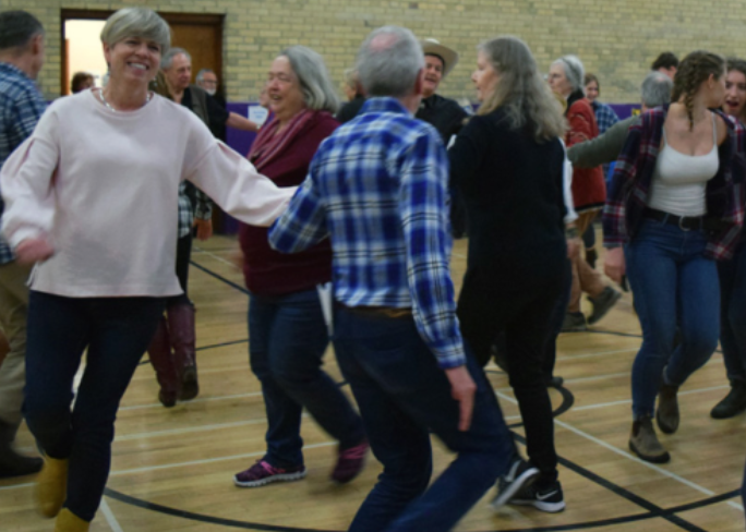 People dancing at the fundraising event