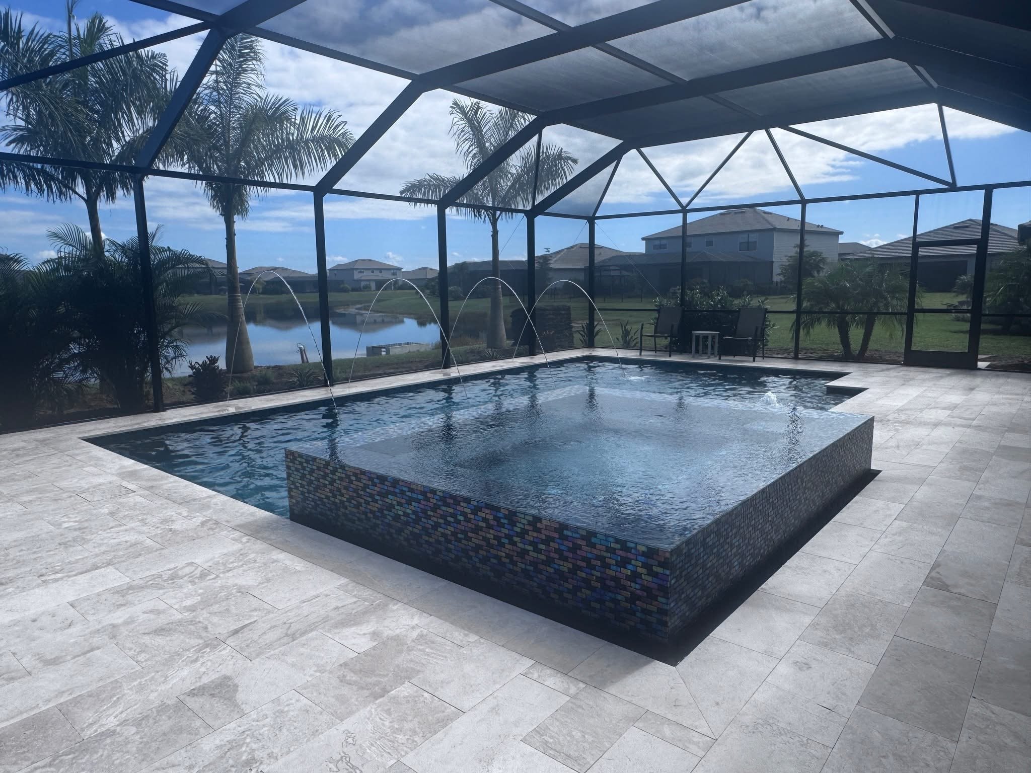 A Backyard Transformation: Custom Pool, Hot Tub &amp; Cage for a New Home in Bradenton, FL