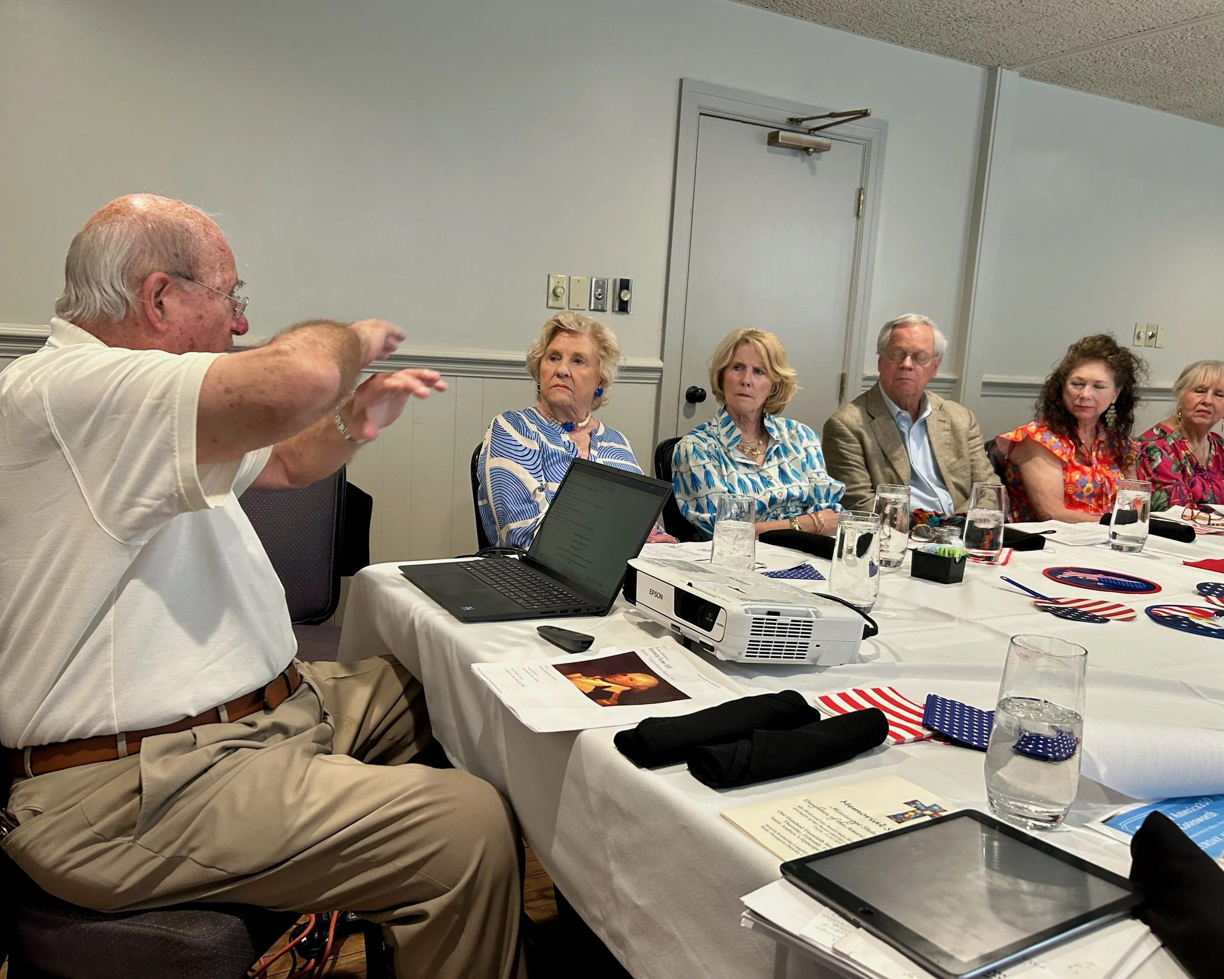  Mr. Bill Lee gives a presentation on the Revolutionary War and "Light Horse" Harry Lee while guests Sally Jane Muirhead, Kathryn and John Pittman, Mary Katherine Coleman, and member Julia Banks listen. 