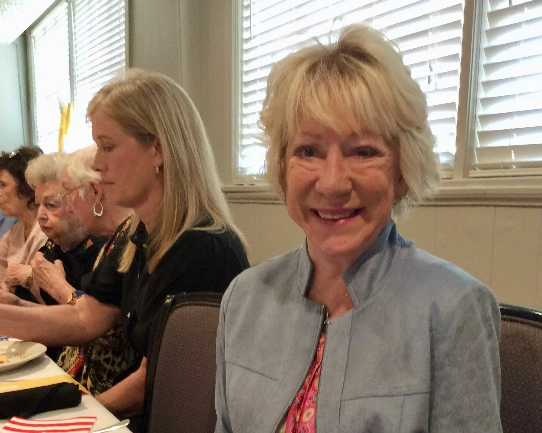  Guest Pam Powers sits next to Romney Brock during the March DAR meeting. 