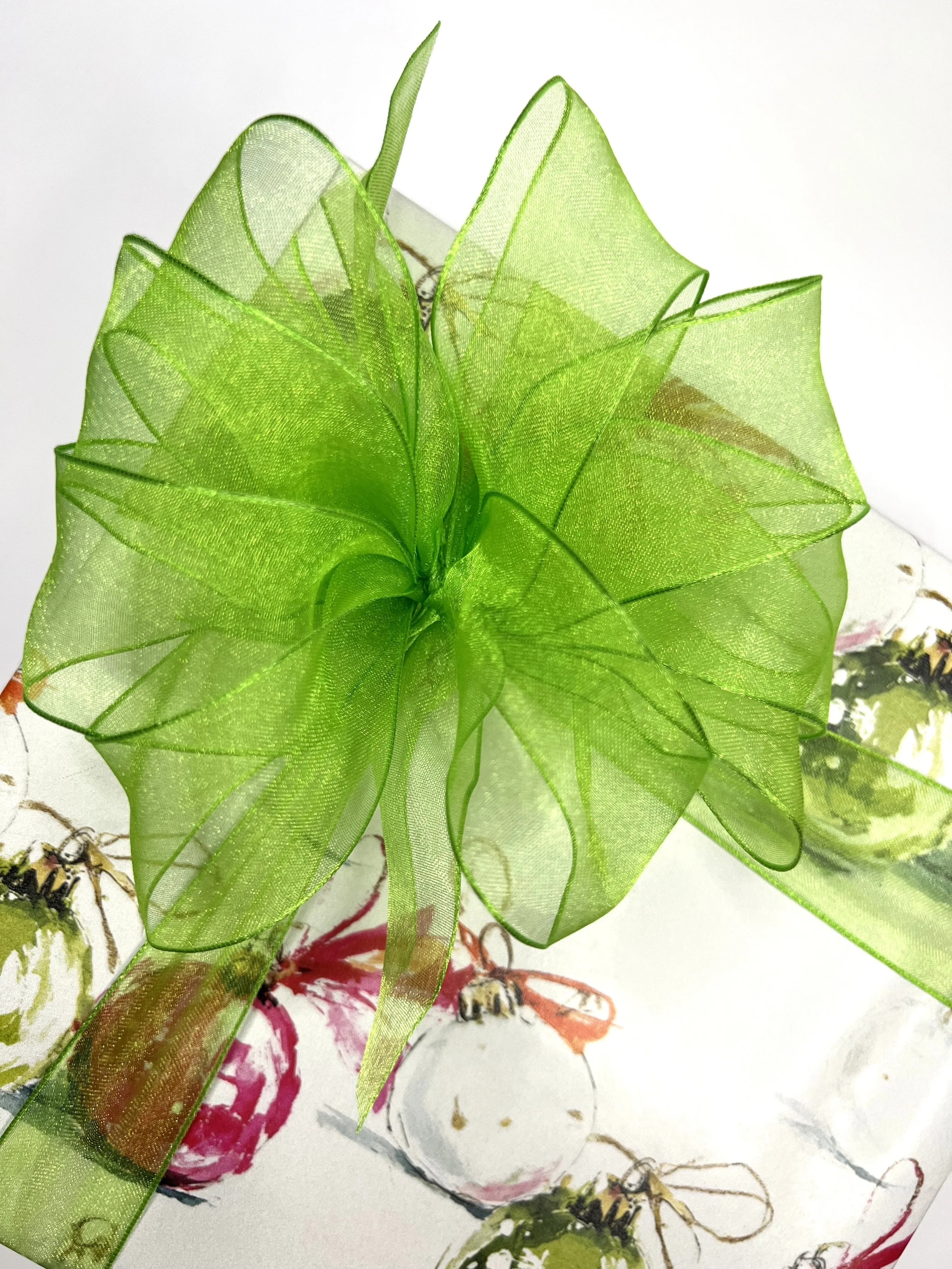 Wrapping hot pink and neon green with green bow.jpeg