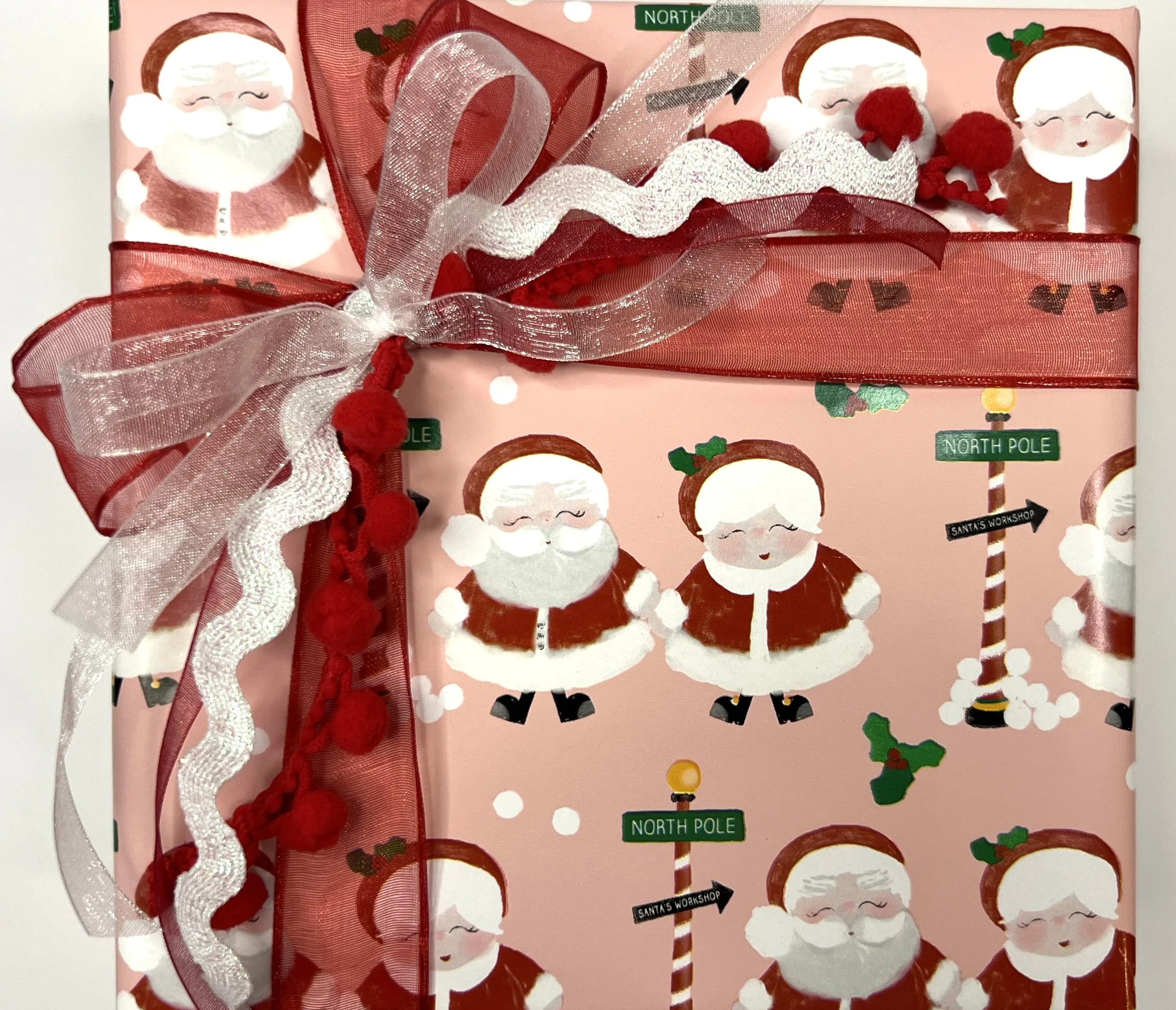 Wrapping Santa and Mrs. Claus 1.jpeg