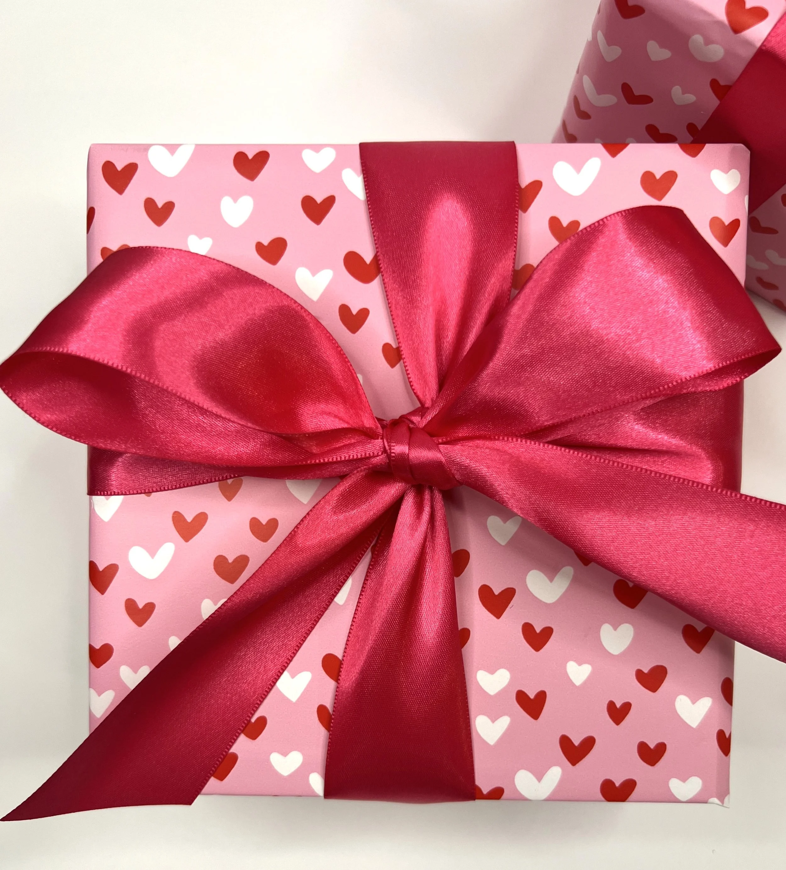 Wrapping Valentine's pink satin bow.jpeg
