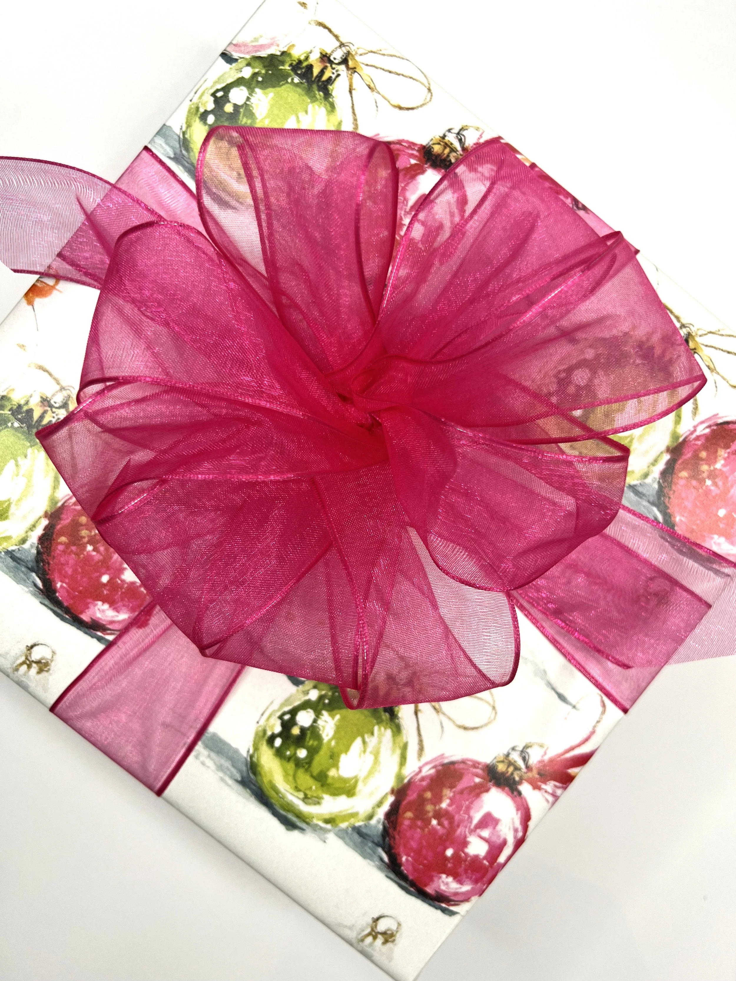Wrapping hot pink and neon green with pink bow.jpeg
