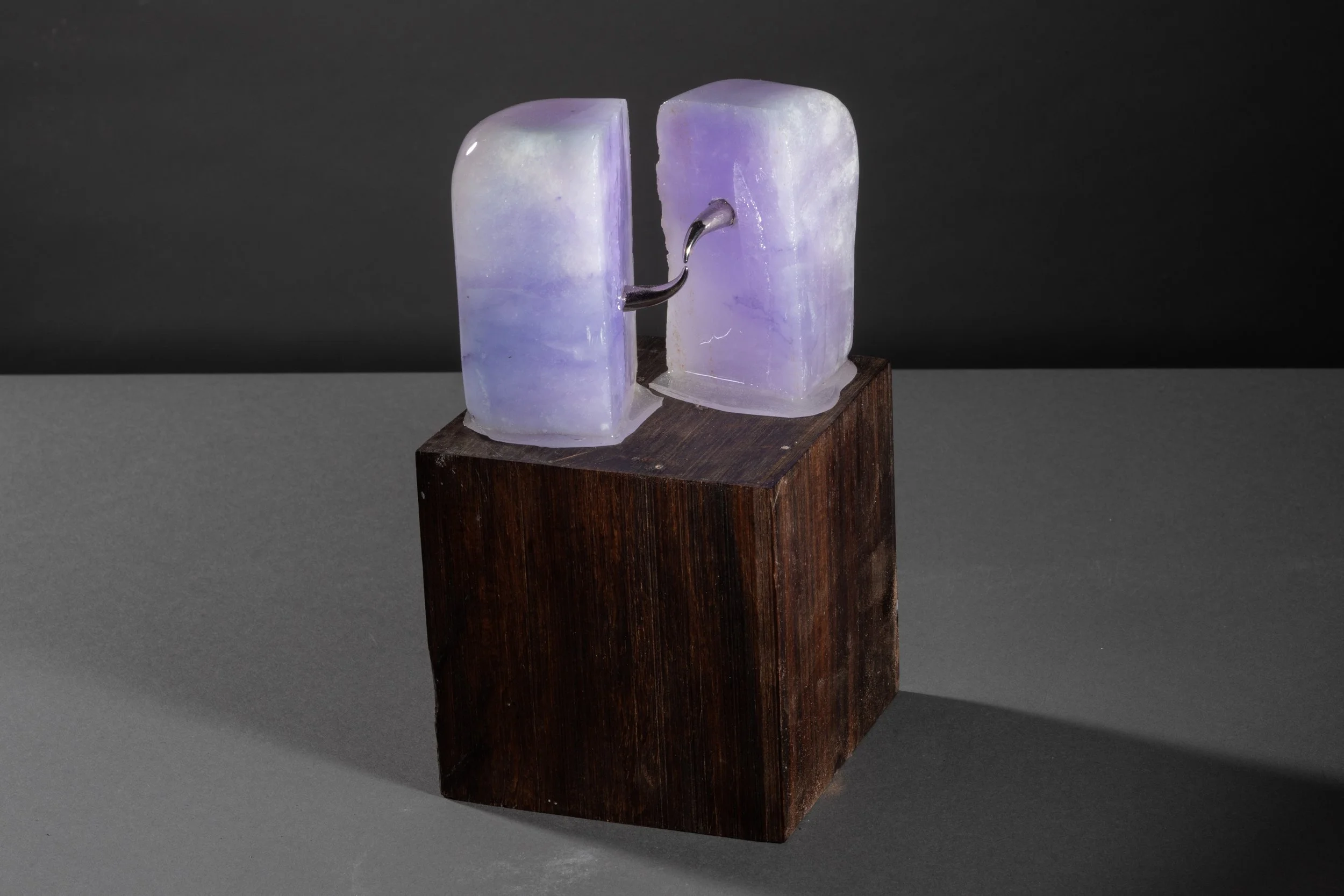 Tidbit No. 3 (Exchange), 2023, Alabaster, ink, metal spikes, Cocobolo wood, epoxy resin, 6 ½ x 3 ½ x 3 ½ in (Photography: Richard R Vallon Jr)