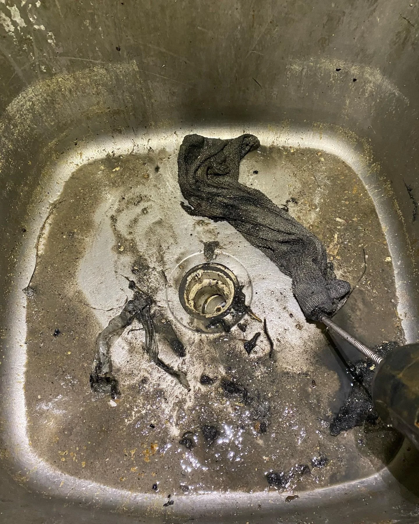 Clogged mop sink was caused by a rag.