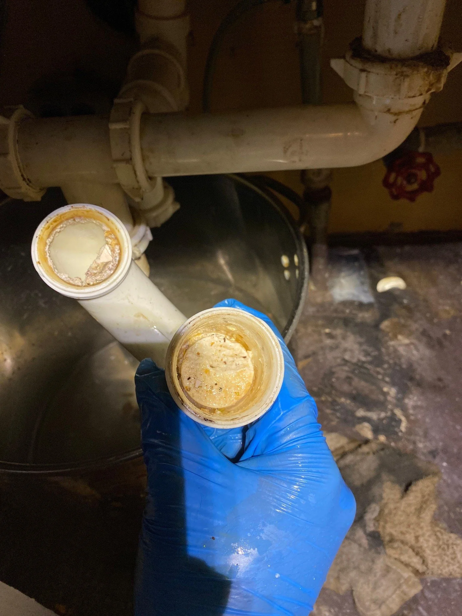 Removing PVC to see what was causing the clogg.