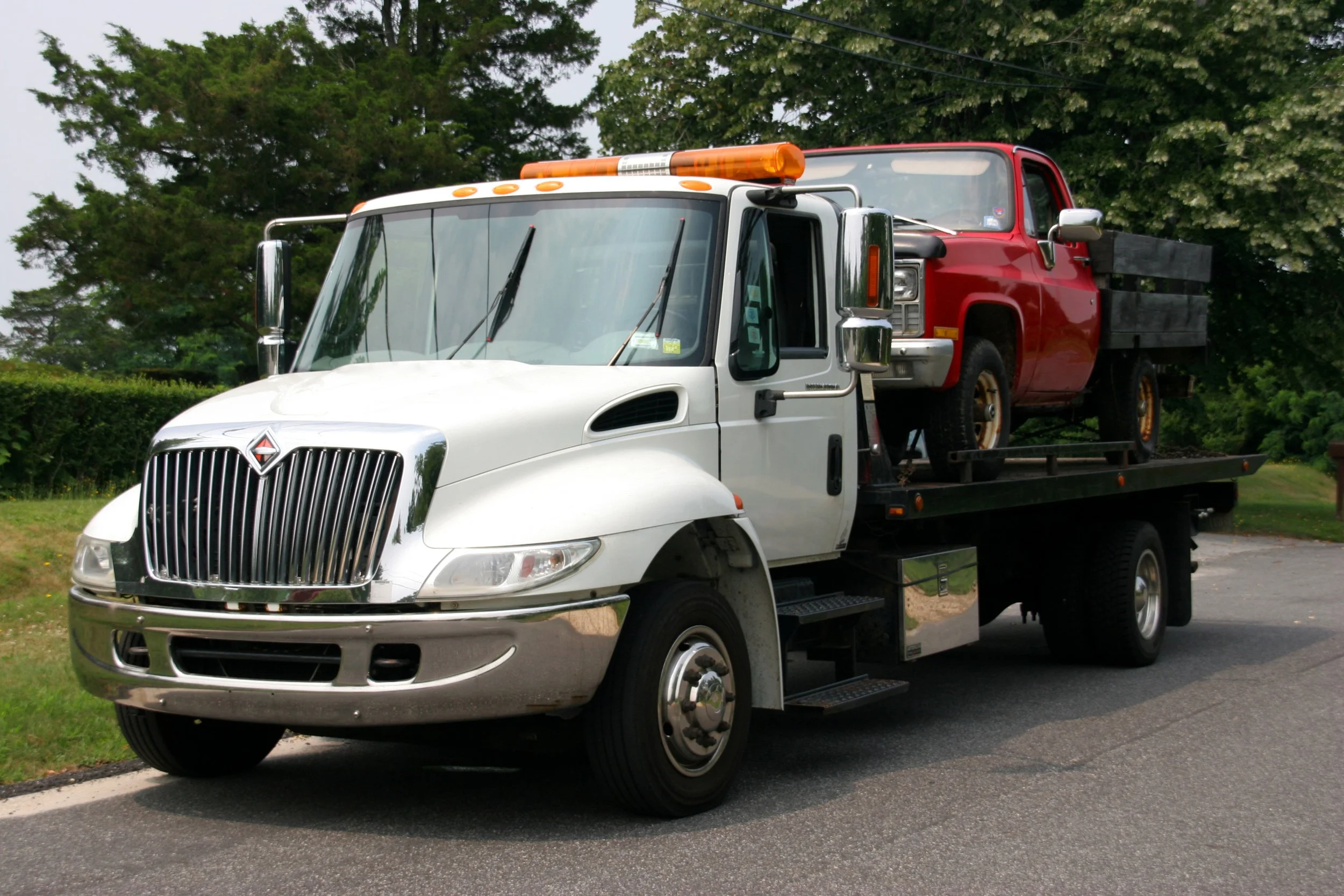 Rollback tow truck
Flatbed tow truck
Vehicle Transport