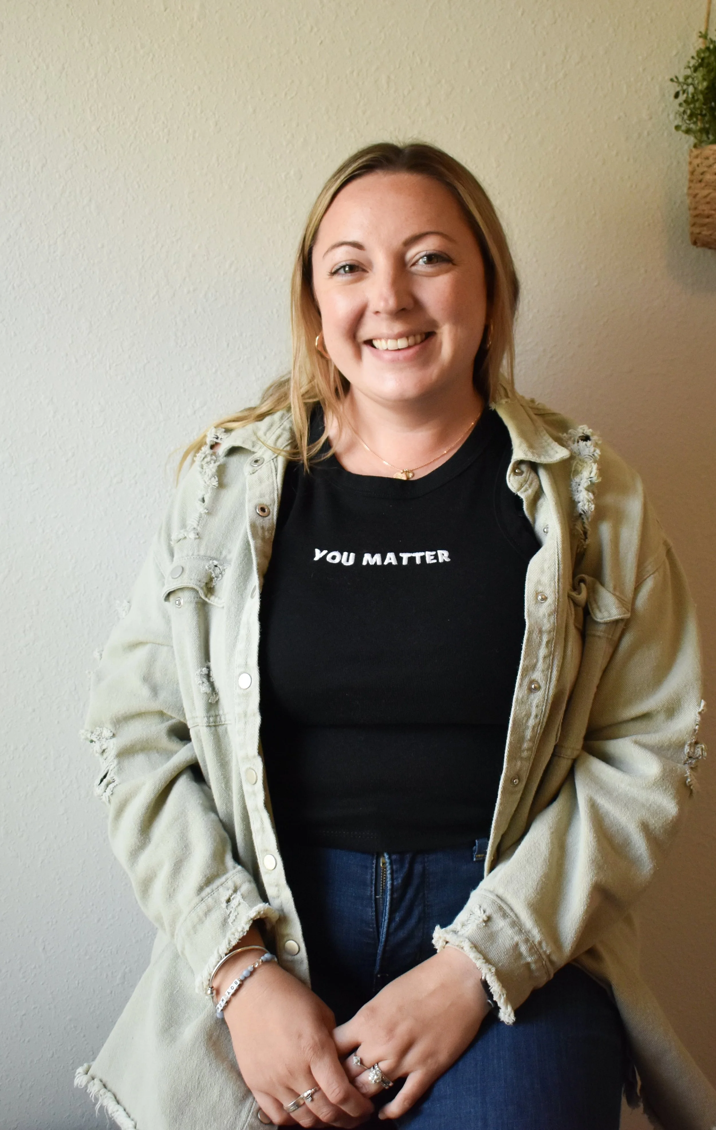 female therapist smiling in headshot