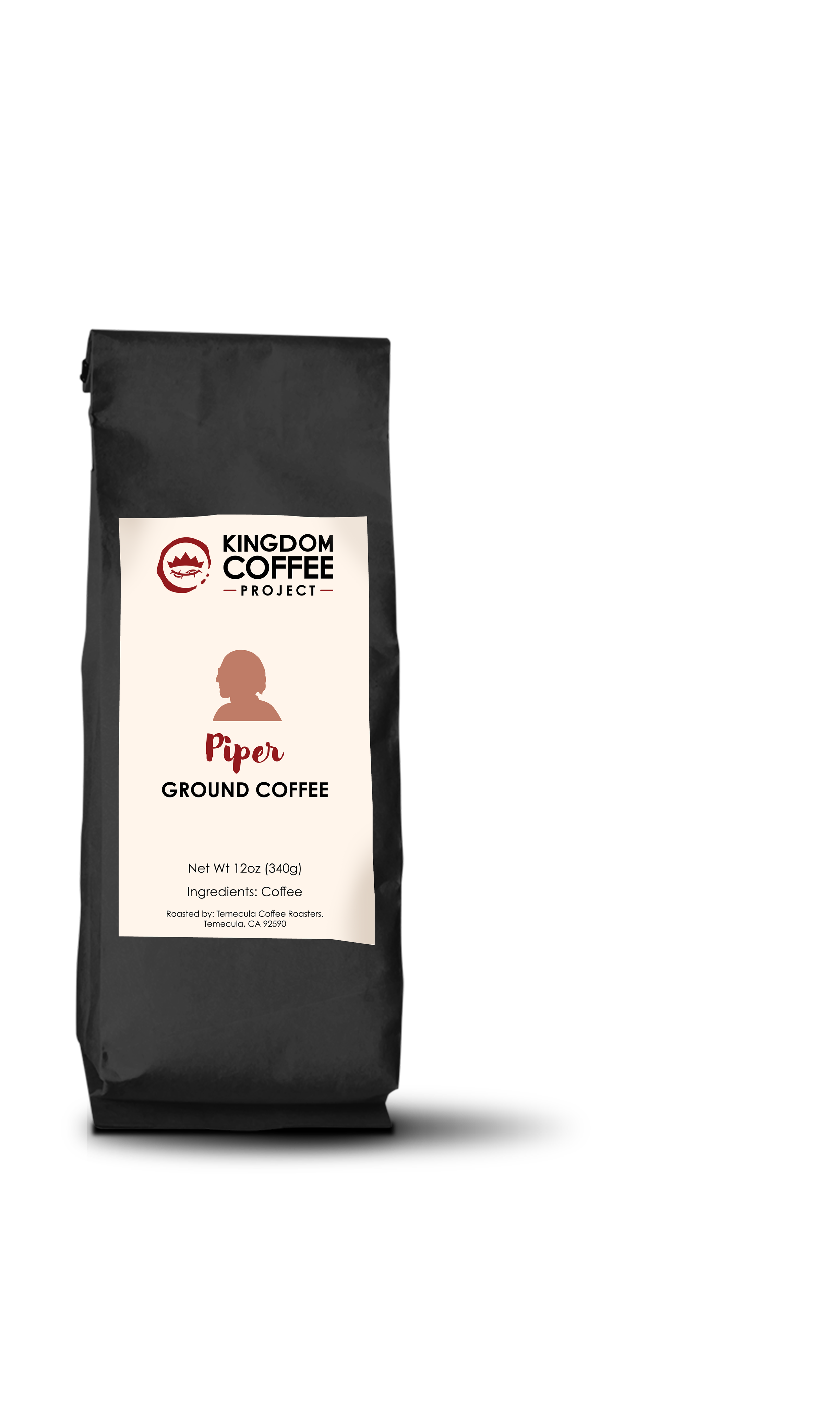 A black coffee bag with a label featuring John Piper