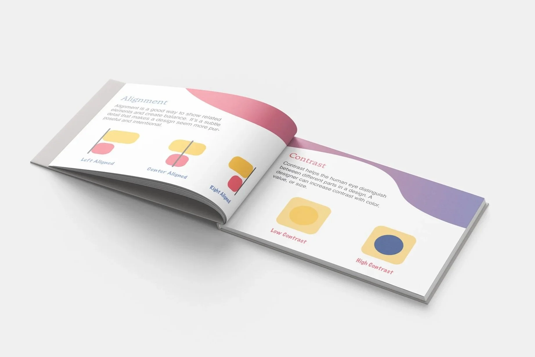 Open book showing pages about color scheme concepts, including alignment and contrast, with diagrams and color samples in pastel shades.