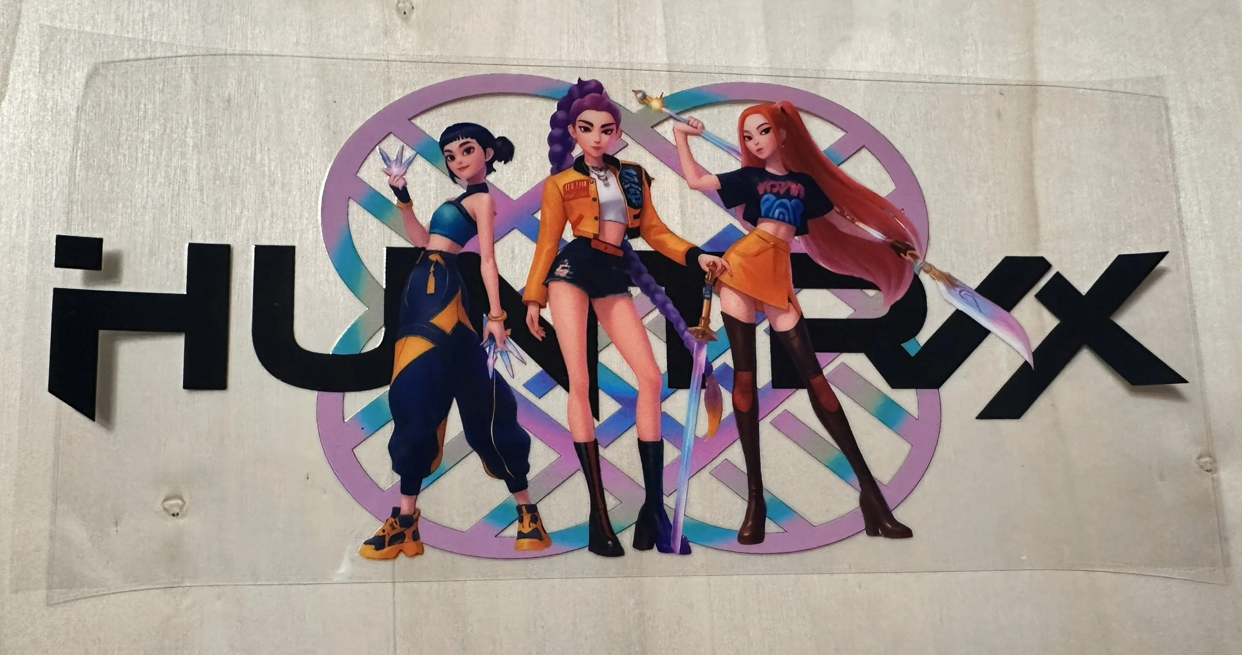 Huntrix- with purple symbol in back