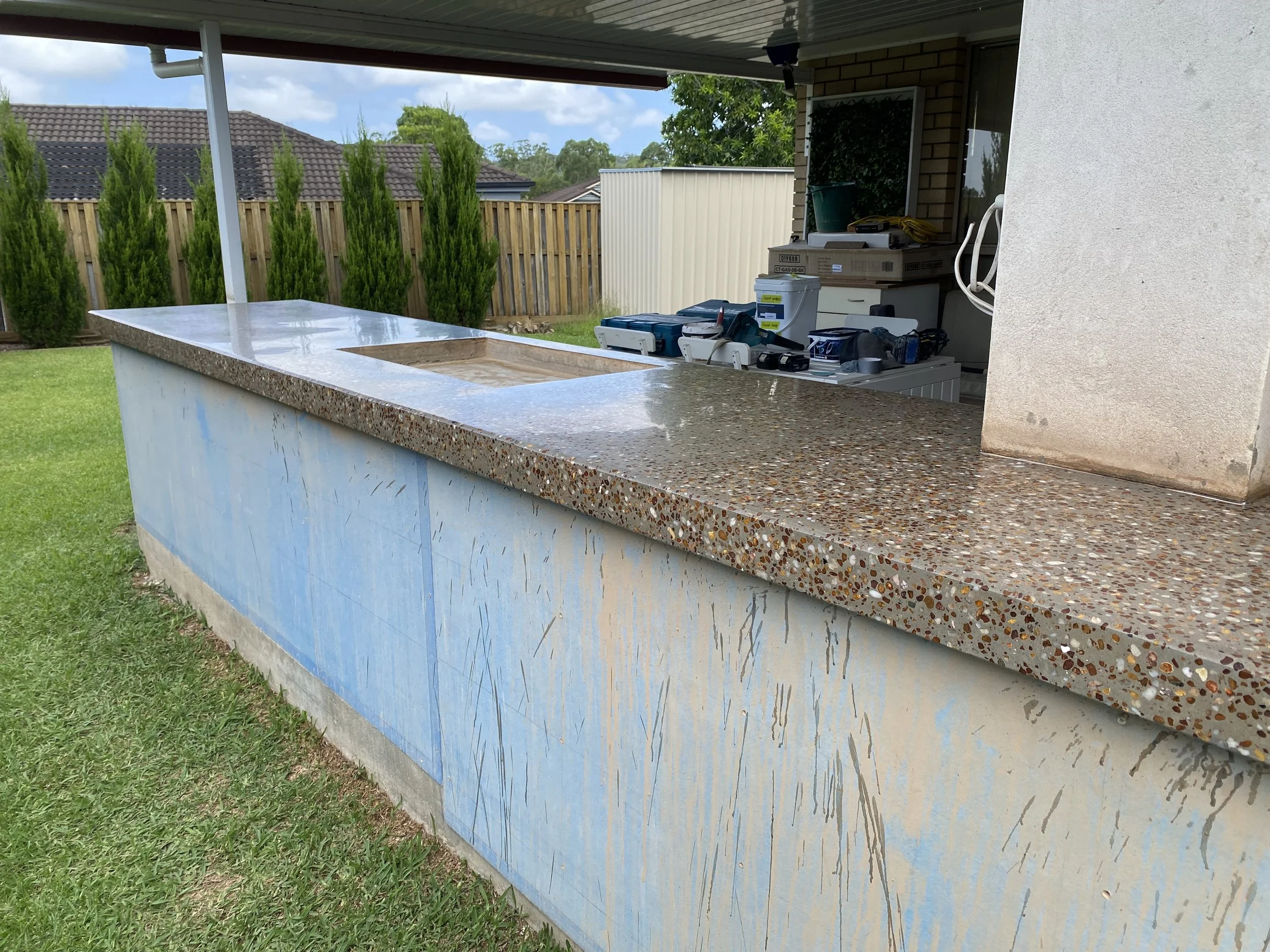 Pour in place specialty concrete mix for external kitchen bench. Polished concrete. 