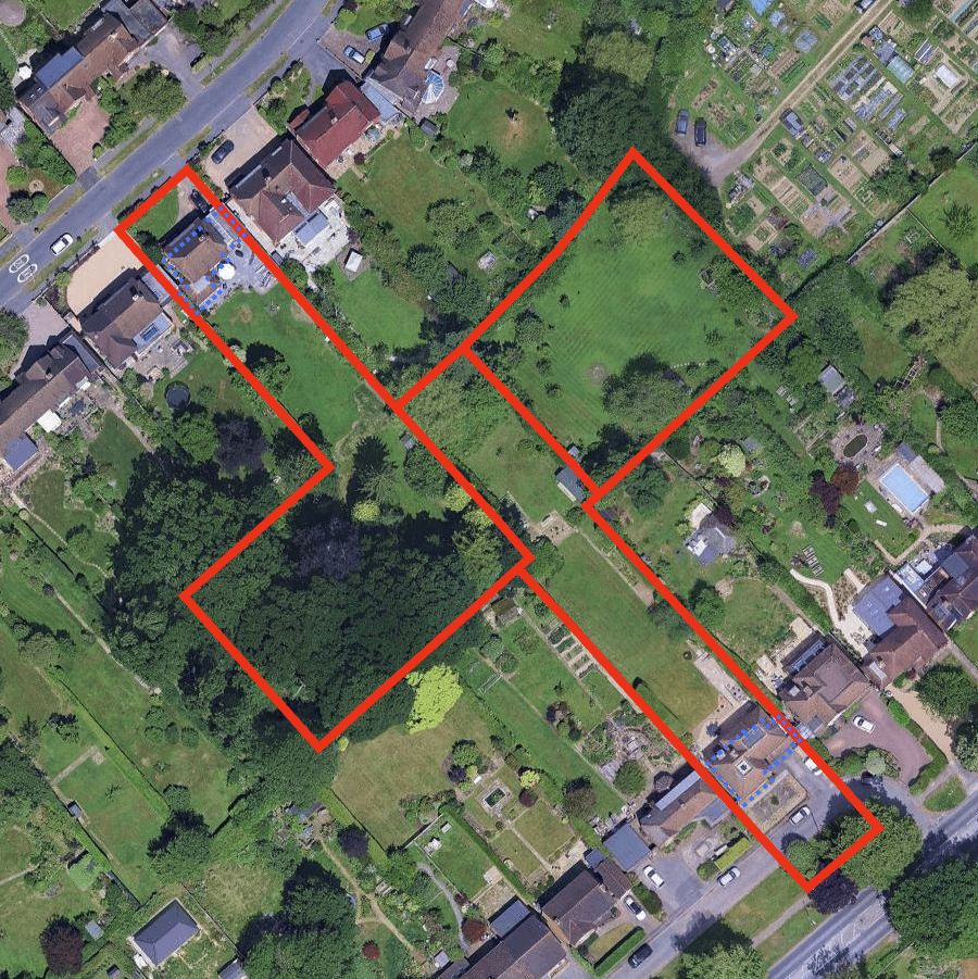 Aerial view of a residential neighborhood with a large backyard outlined in red, containing trees, open grassy areas, and part of a house with a swimming pool and patio.