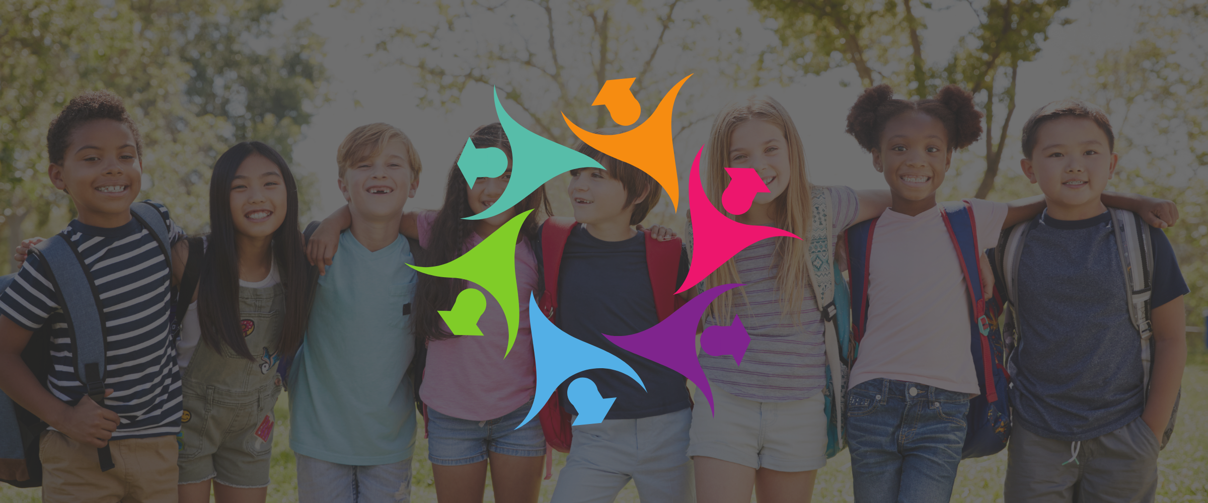 Group of diverse children standing outdoors with their arms around each other, smiling, during daytime with trees in the background, overlaid with a colorful, abstract logo featuring human figures in various colors.