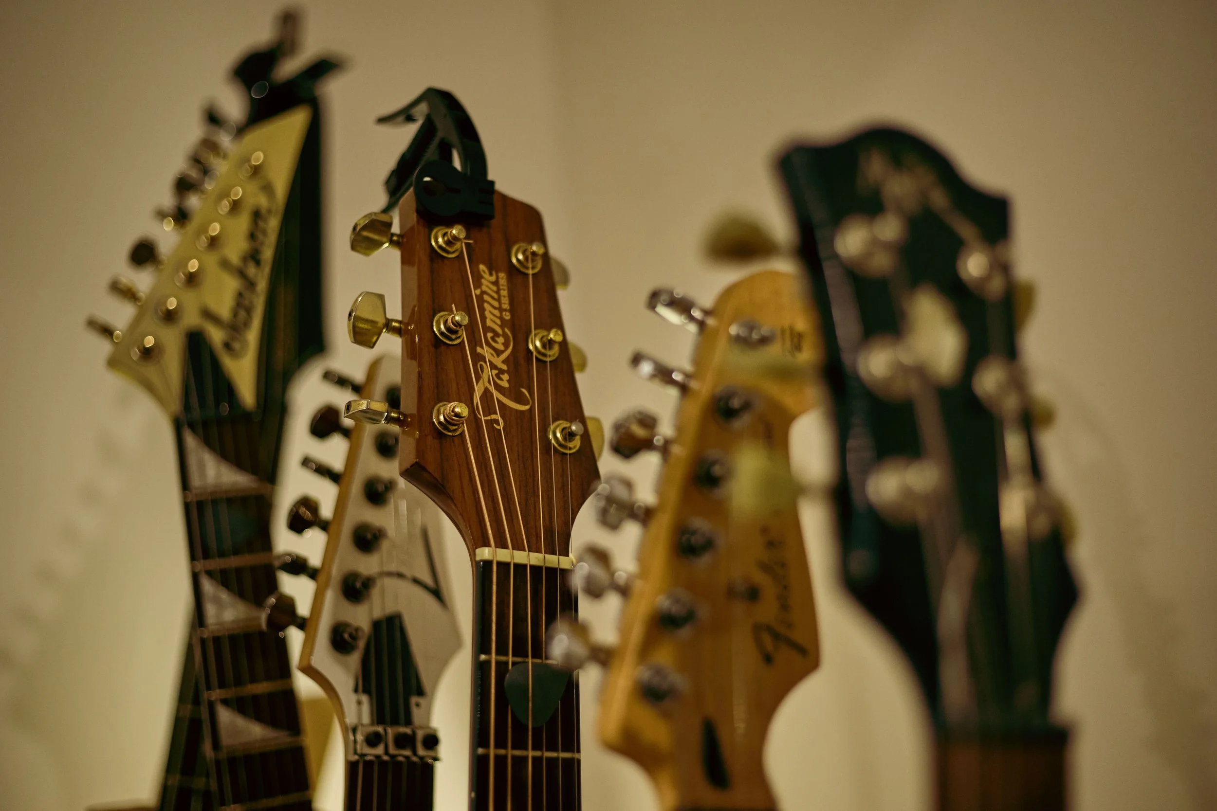 Close-up of multiple guitars