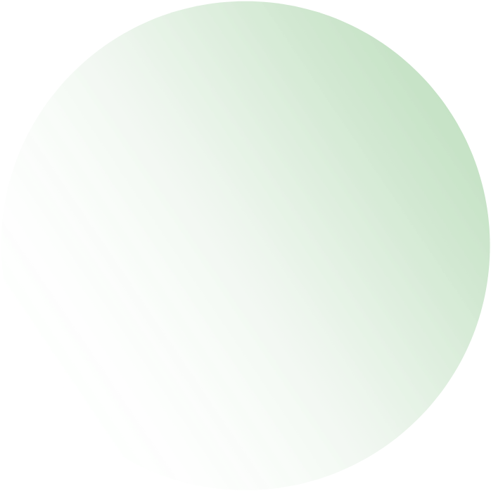A 3D green sphere with a glossy surface, partially cut to show interior layers.