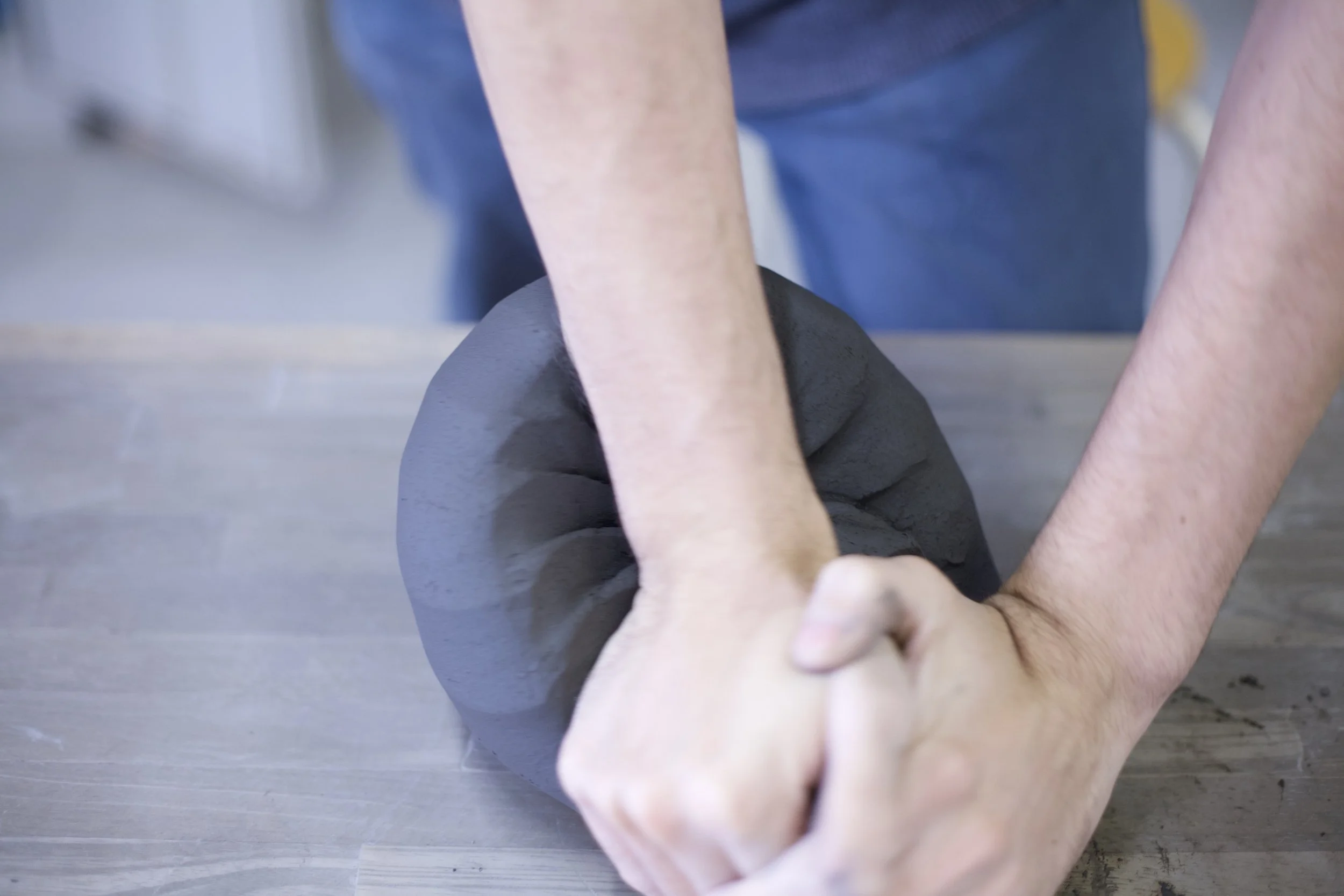 Wedging process in a traditional Japanese studio.