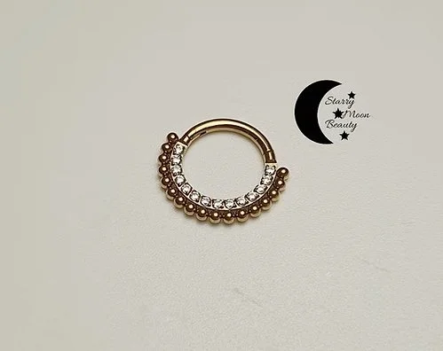 Golden gem clicker ring