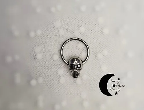 Skull clicker ring