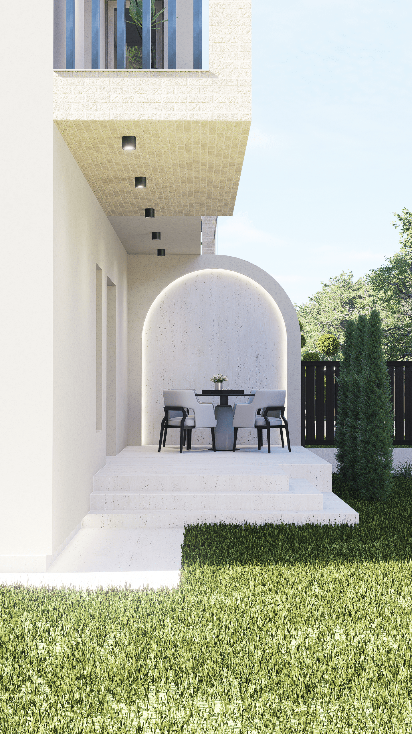 Modern outdoor patio with white steps, black round table, four white chairs, small flower arrangement, arched wall with LED lighting, grassy yard, trees, and a black wooden fence.
