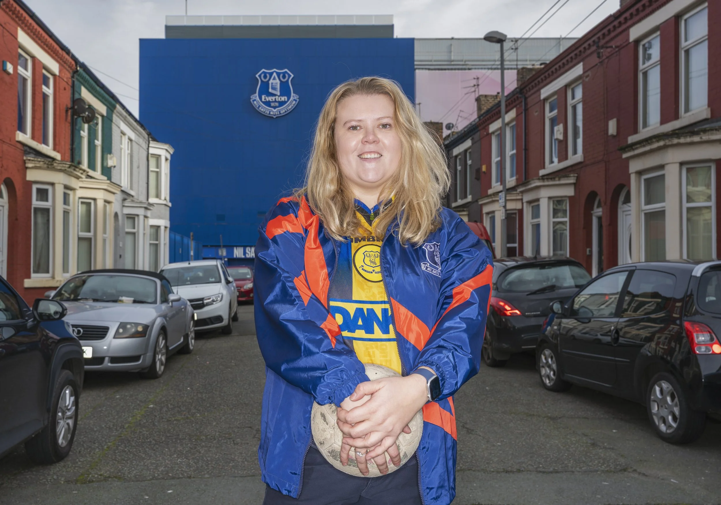 Everton supporter and shirt collector Laura Gates outside the legeendary stadium Goodison Park, now home to the women's team.