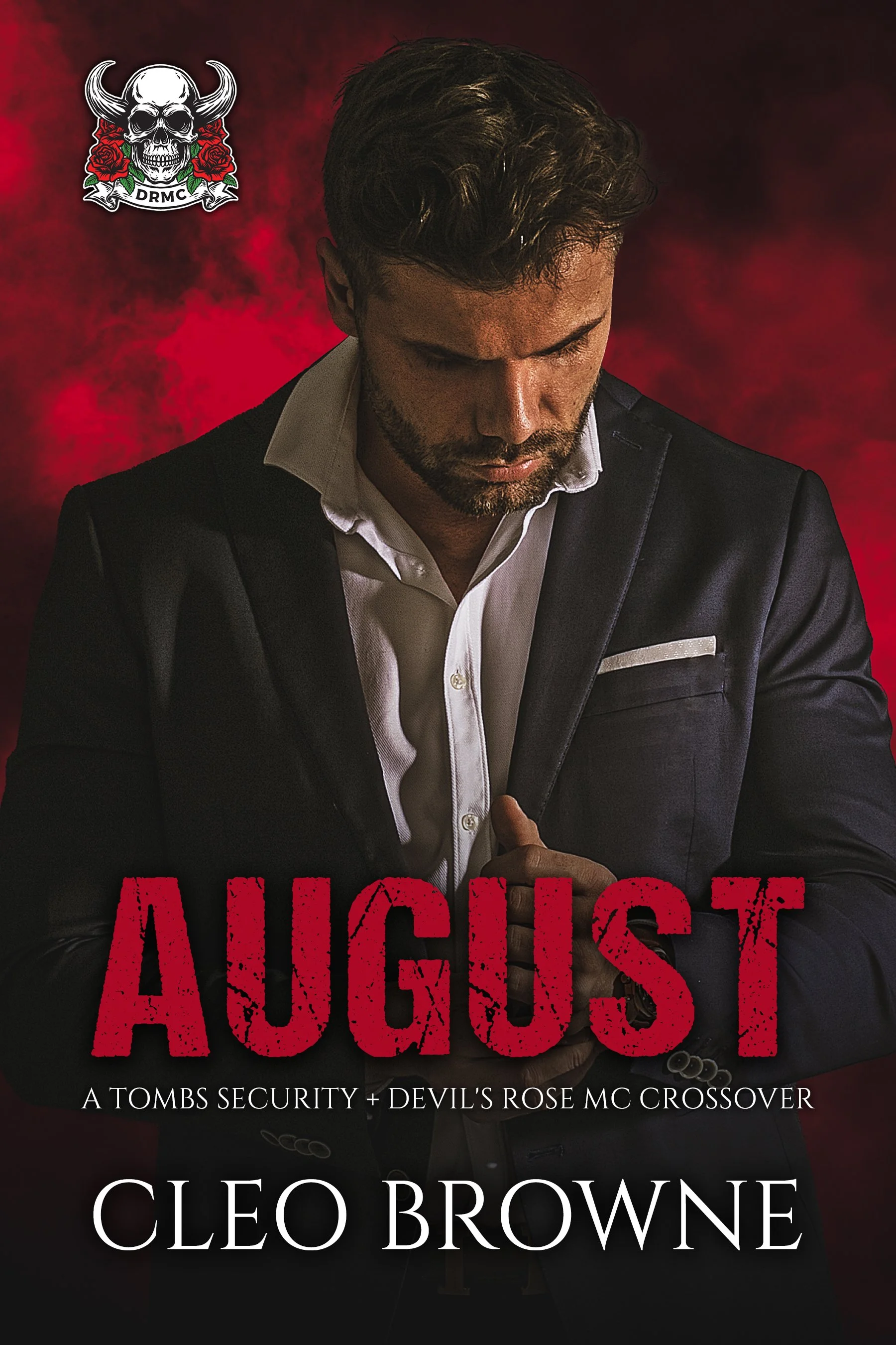 Book cover for "August" by Cleo Browne, featuring a man in a dark suit with a white shirt and a red smoky background, and a skull with horns and roses logo in the top left corner.