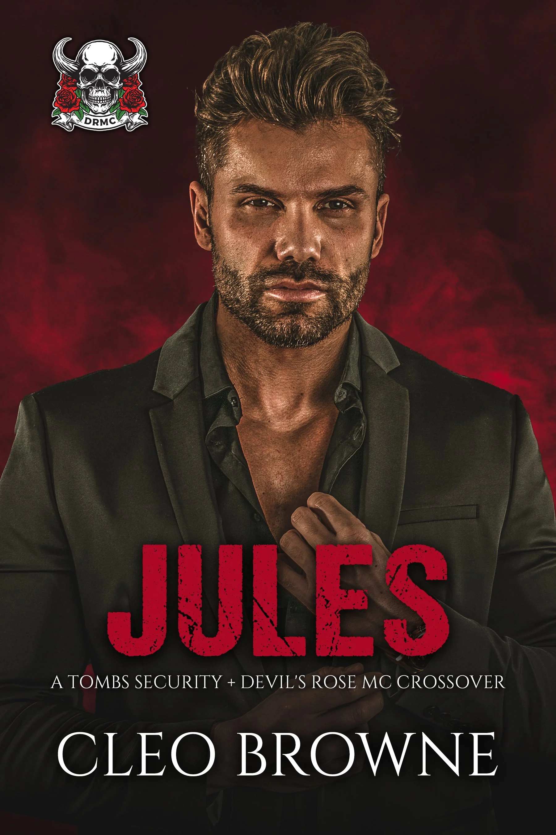 Book cover featuring a man in a suit with a serious expression, set against a dark red background. Title "Jules" in bold red letters, author Cleo Browne, with subtitle "A Tombs Security + Devil's Rose MC Crossover". Top left corner has logo of a skull with horns, roses, and the initials "DRMC."