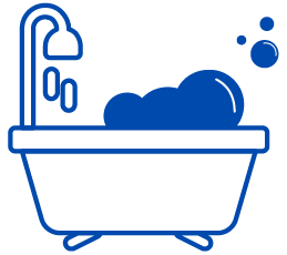 Outline of a bathtub with bubbles and a showerhead.