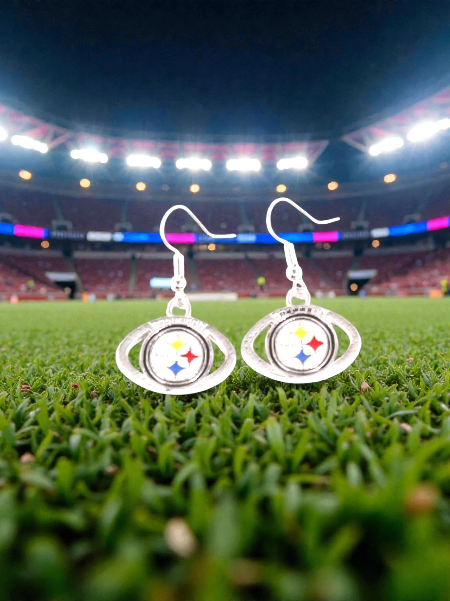 E103 Pittsburgh Steelers With A Football Curve Earrings