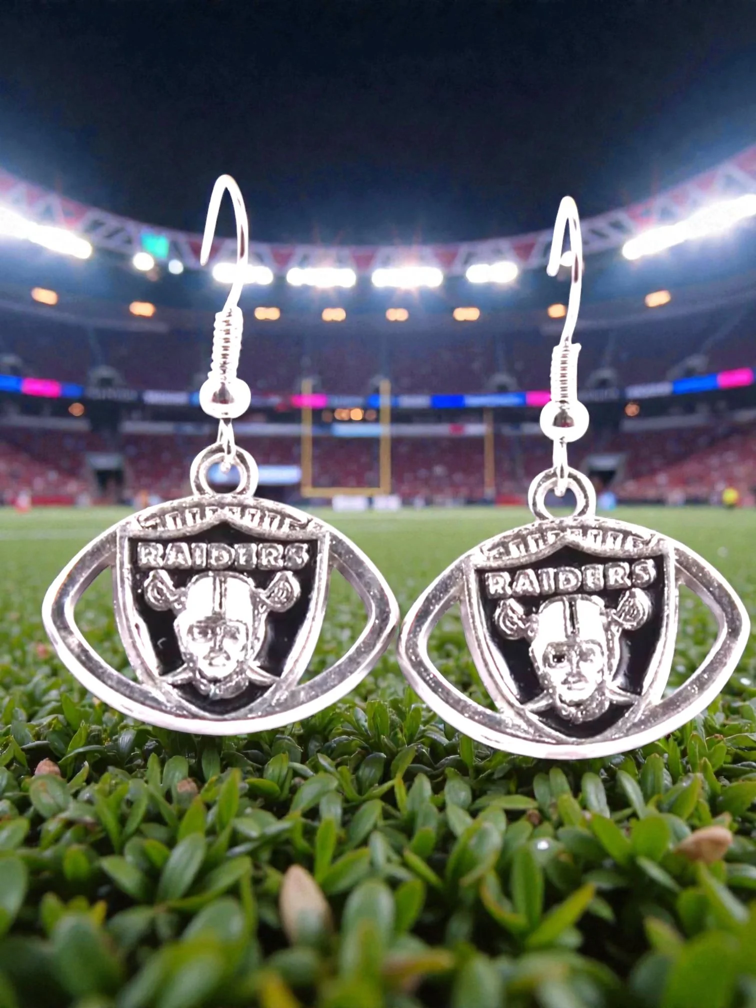 E109 Oakland Raiders With A Football Curve Earrings