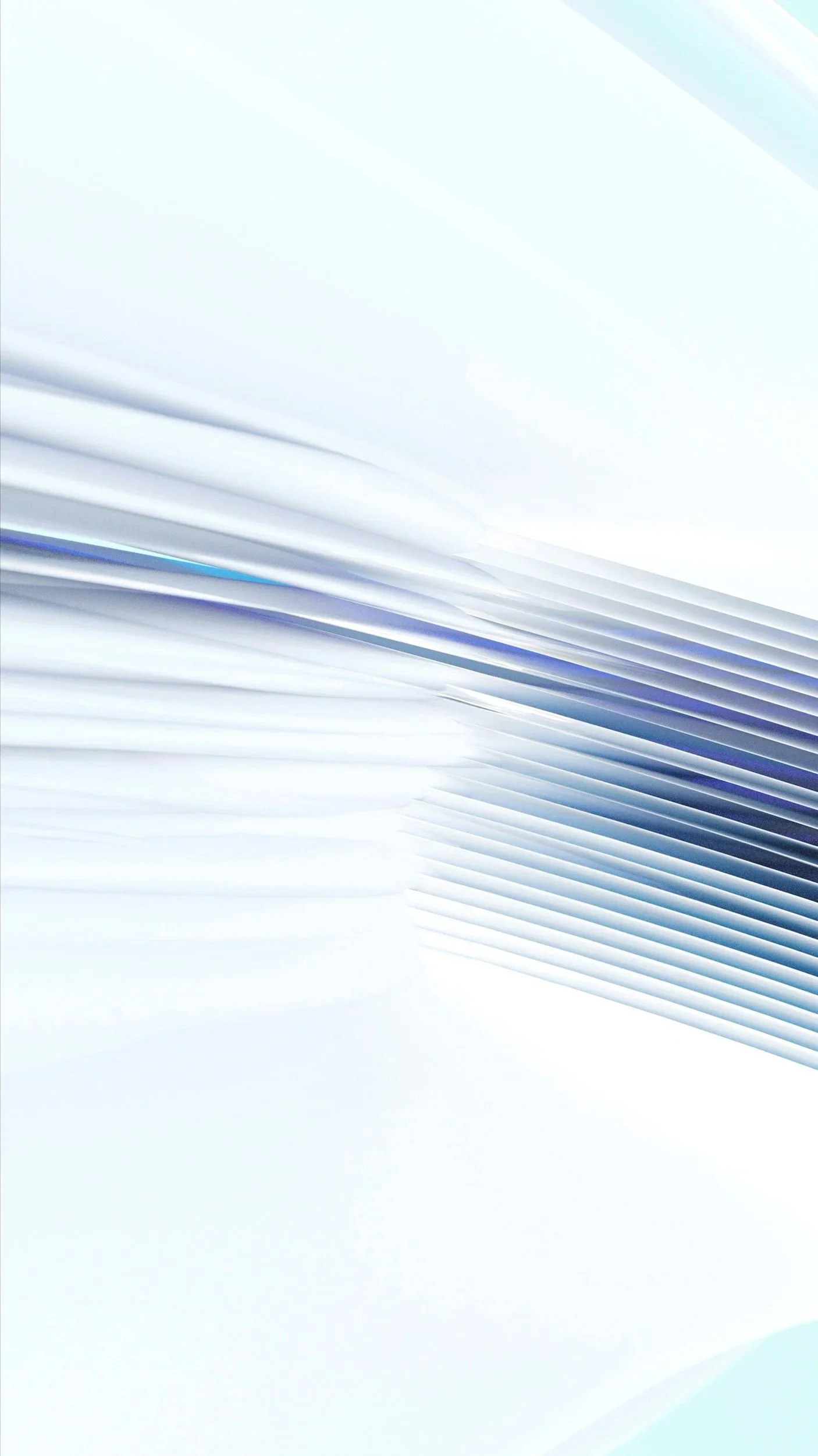 Close-up view of white papers or documents stacked and fanned out.